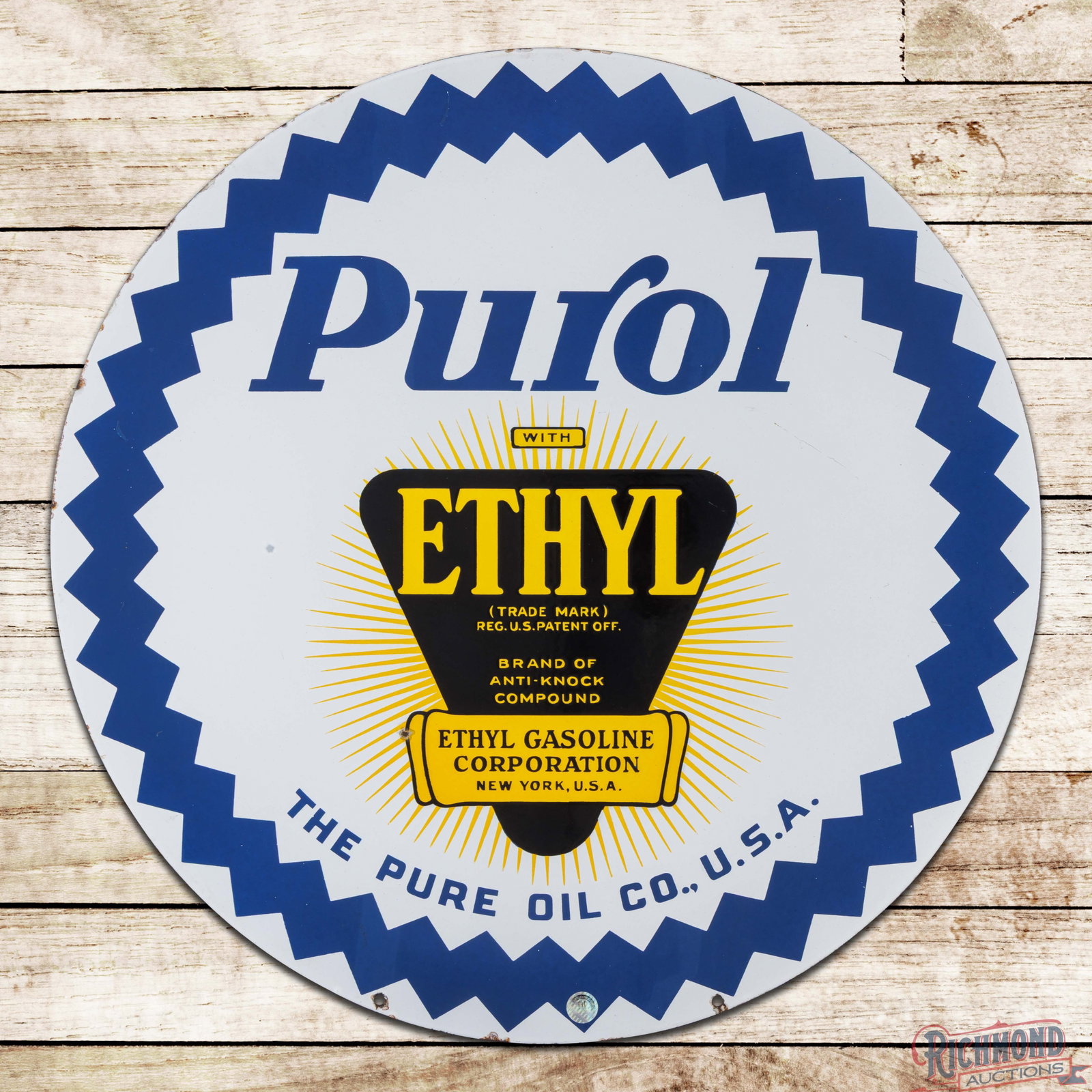 Purol Ethyl Gasoline 30" DSP Sign w/ Logo: DSP sign has excellent color and gloss. Side #1 is very clean overall showing a small chip in the lower field and minor marks in the outer fields. The perimeter has small chips along the outer edges. 