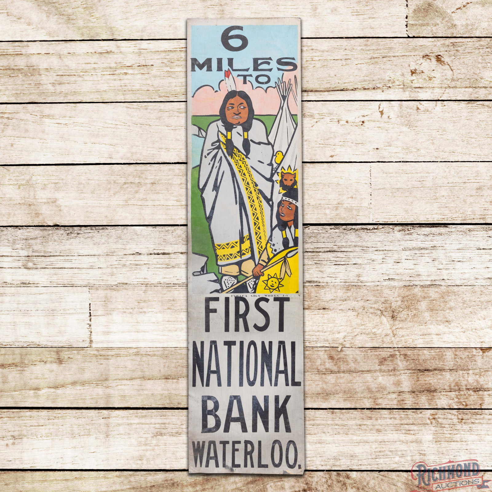 NOS 6 Miles to First National Bank Waterloo Single Sided Tin Ithaca Sign w/ Native Americans: NOS SST sign has excellent color and shine. The display features detailed graphics of a Native American family with tipis. The sign exhibits light storage wear in the fields with small scuffs and ligh