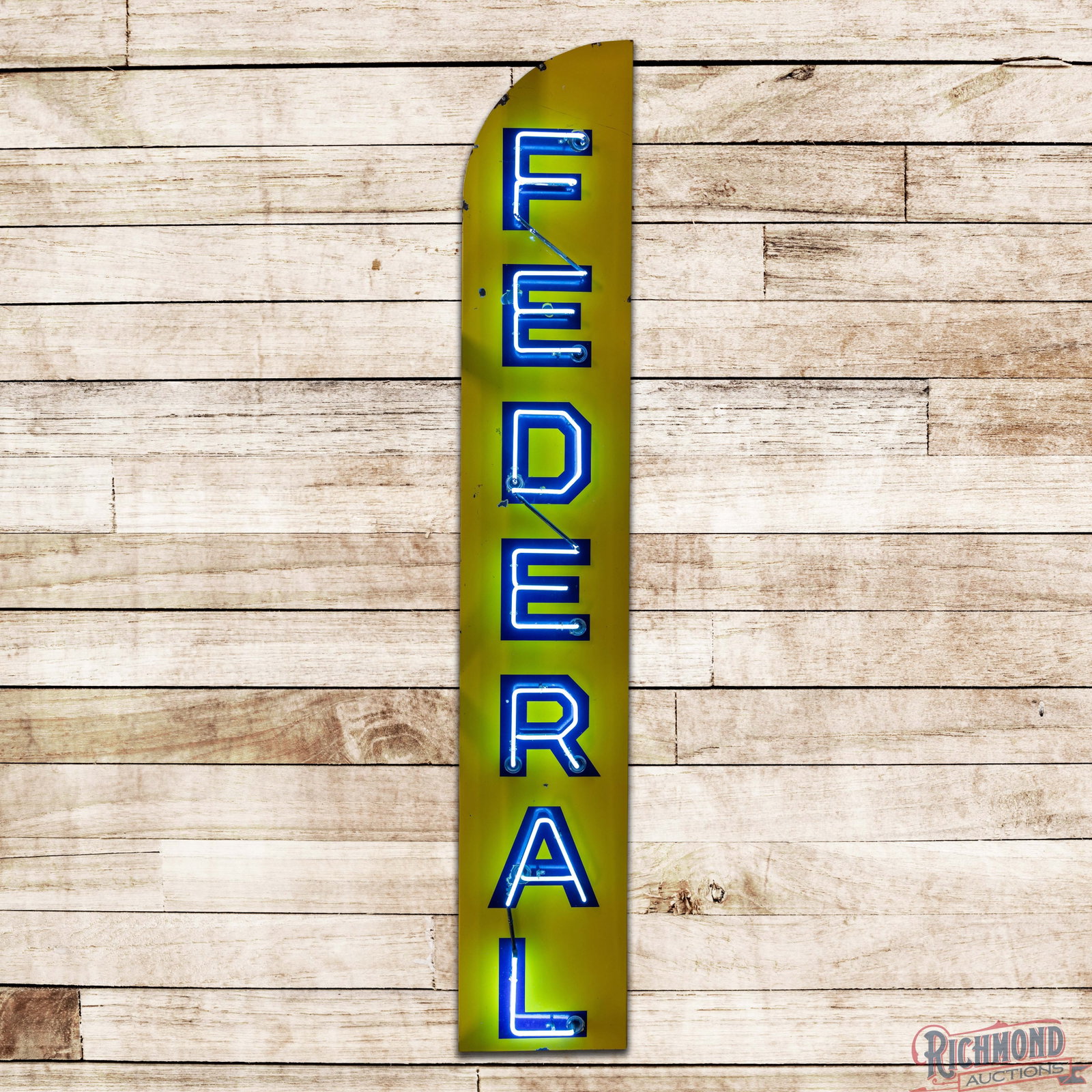 Federal Trucks 10' SSP Factory Neon Sign: SSP factory neon sign with metal can has very good color and gloss. The display has light wear with chips and marks in the outer fields. The perimeter has small chips along the edges with errant black