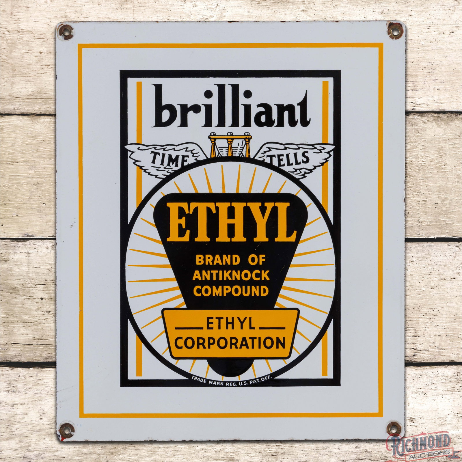 Rare Johnson Brilliant Ethyl Gasoline SSP Pump Plate Sign w/ Logo: SSP pump plate has excellent color and gloss. The sign features heavy shelving with the Time Tells and Ethyl logos. The field is clean. The perimeter has light wear with flea bites and minor grommet l