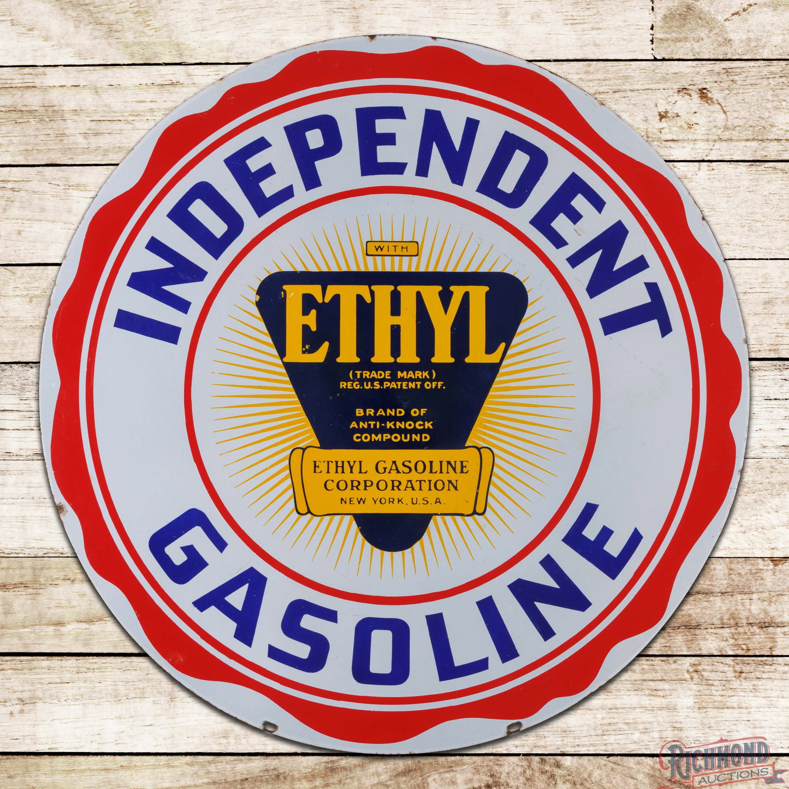 Independent Ethyl Gasoline 30" DSP Sign w/ Burst Logo: DSP sign has excellent color and gloss. The display has a clean field with minor marks. The perimeter has small chips with minor crazing along the outer edges. The reverse has tiny chips and factory b