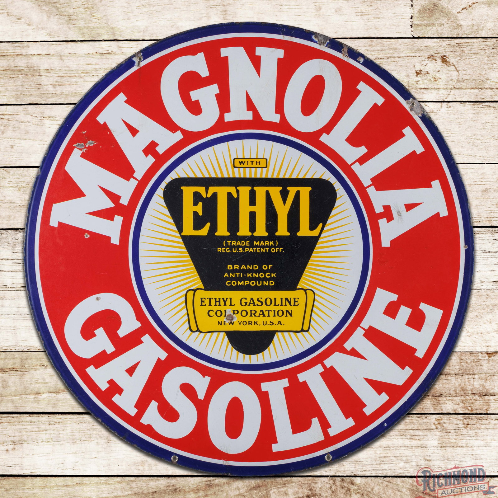 Magnolia Ethyl Gasoline 30" DSP Sign w/ Logo: DSP sign has good color and gloss. Side #1 has light surface wear with bruises and areas of crazing. The perimeter has chips at the upper mounting holes and edges. The reverse has additional chips in 