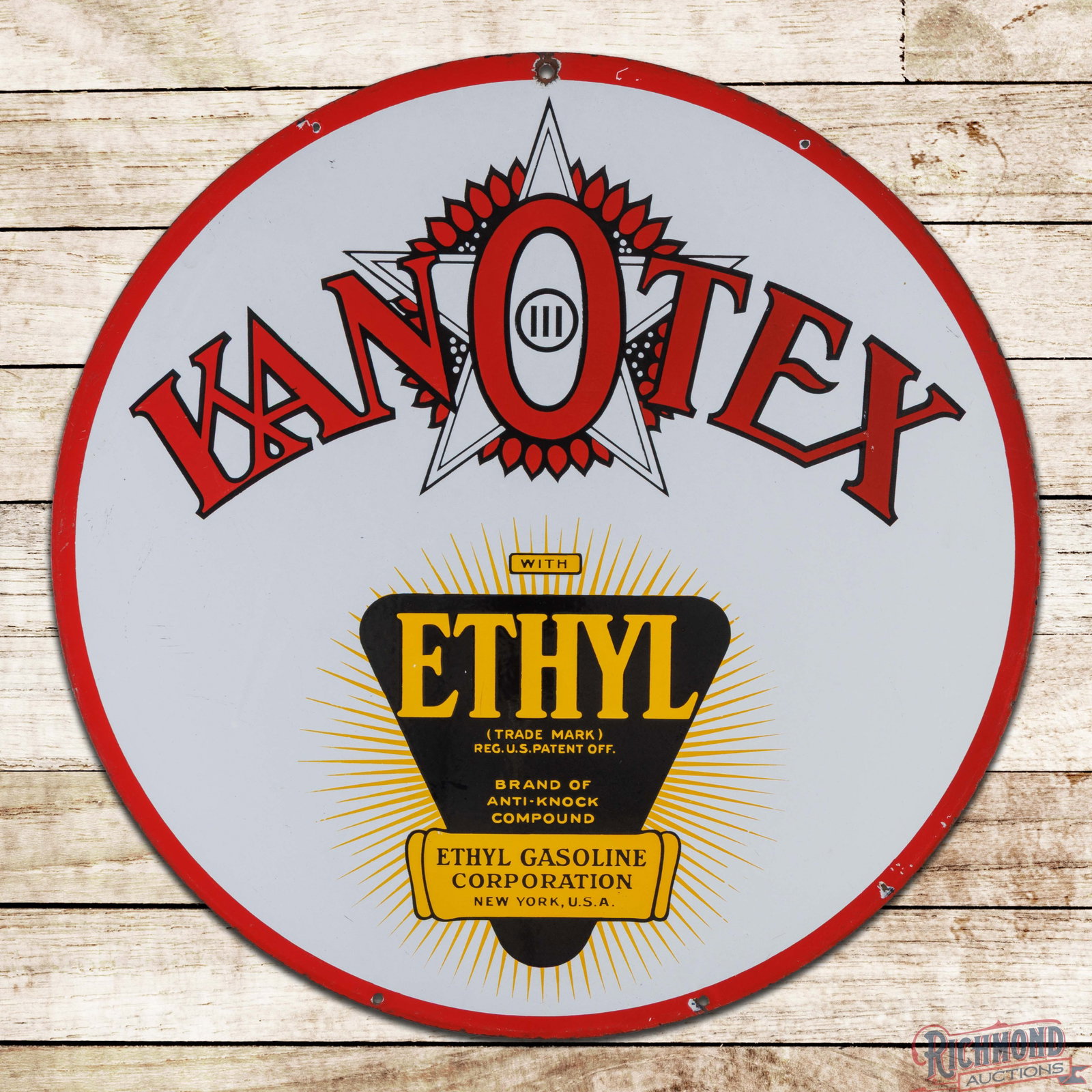 Kanotex Ethyl Gasoline 30" DSP Sign w/ Logo: DSP sign has outstanding color and gloss. The display has a clean field with minor marks. The perimeter has three added mounting holes along the upper edges with small chips. The reverse is in a simil