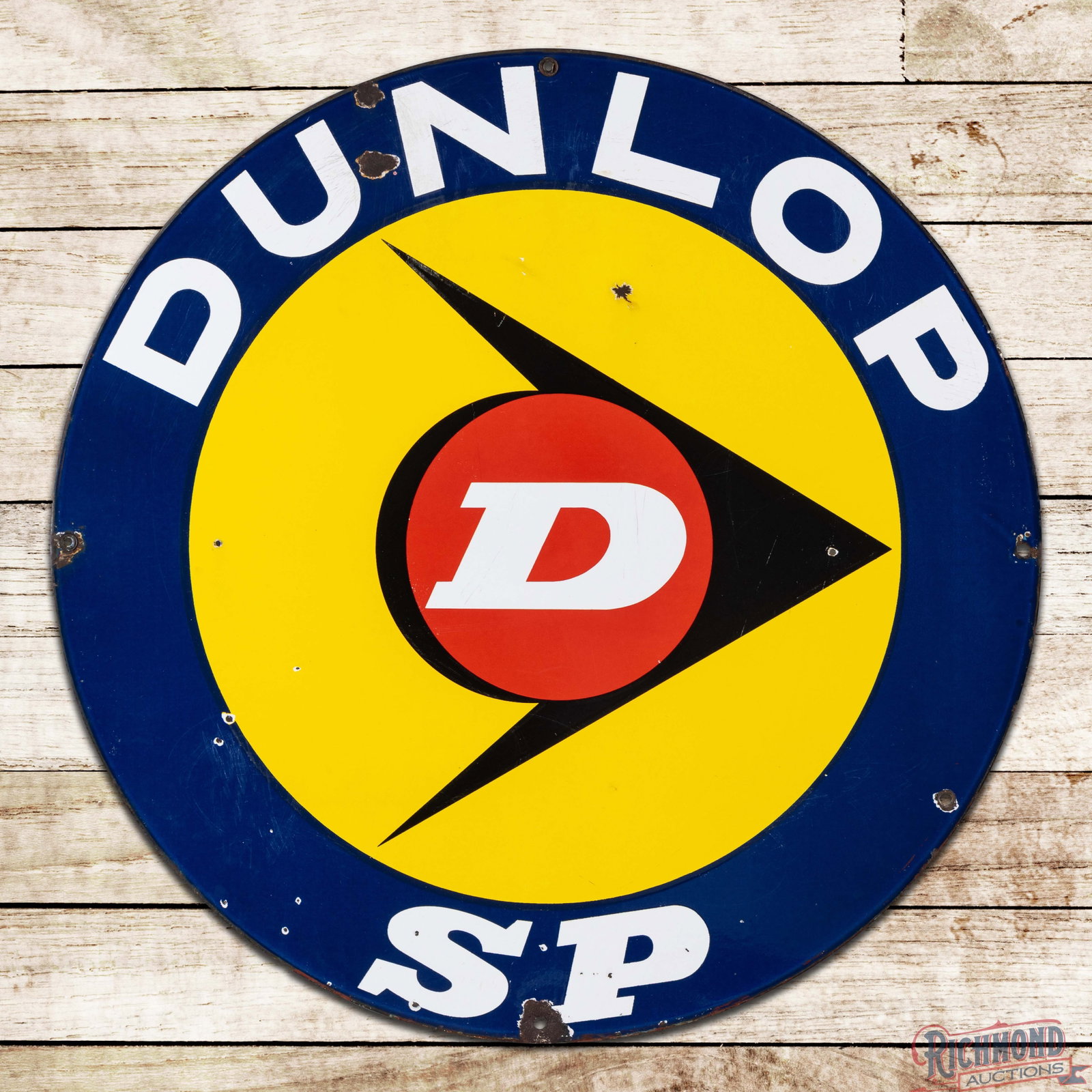 Dunlop Tires SP 27.5" DSP Logo Sign: DSP sign has excellent color and gloss. Side #1 has two tiny non-factory holes in the field. The outer fields and perimeter have chips, minor crazing and a non-factory hole on the edge at 8 o'clock. T