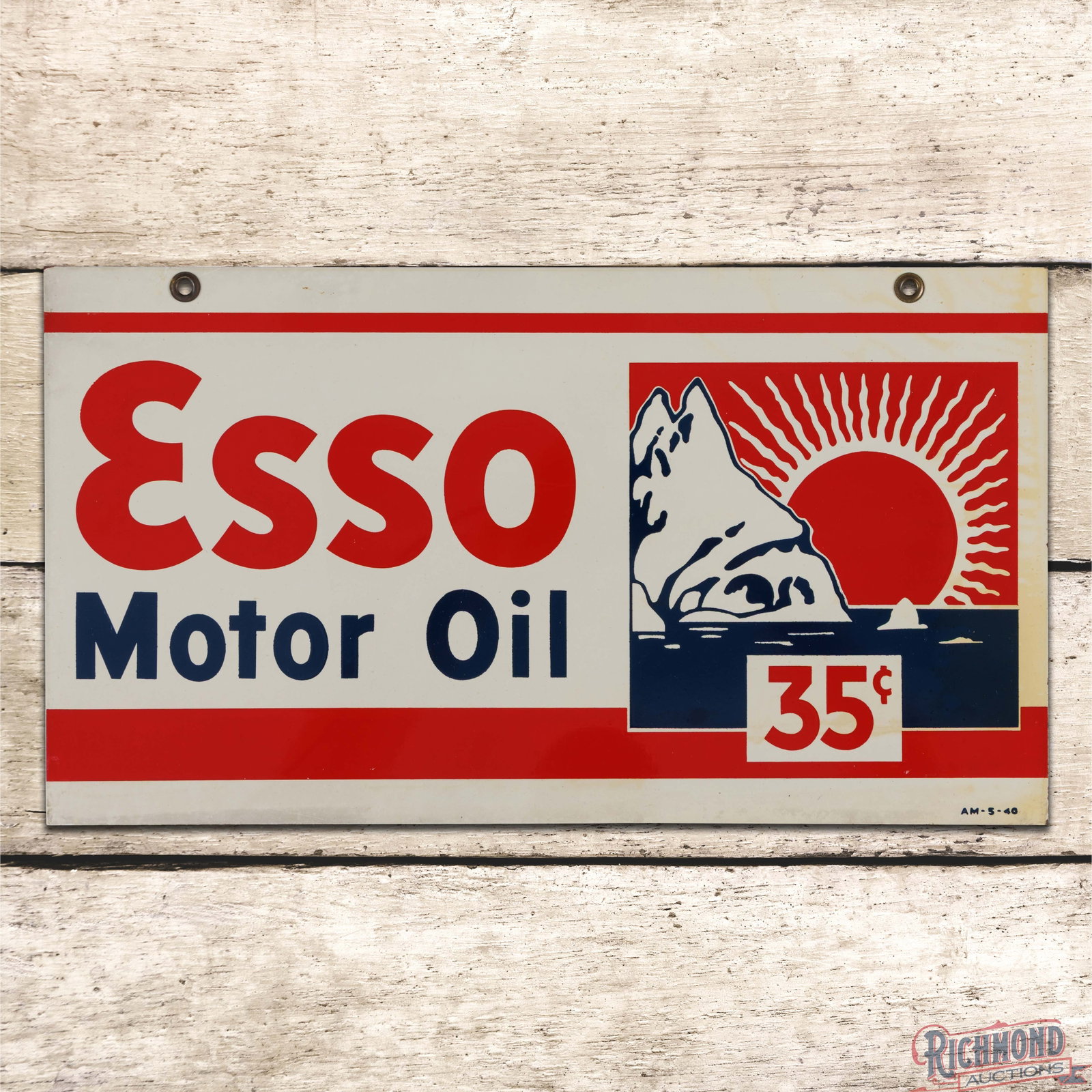 1940 Esso Motor Oil DST Sign w/ Sun Logo: DST sign has excellent color and shine. The display has a clean field with toning in the right fields and outer edges. The reverse has paper marks with toning and surface wear on the lower right corne