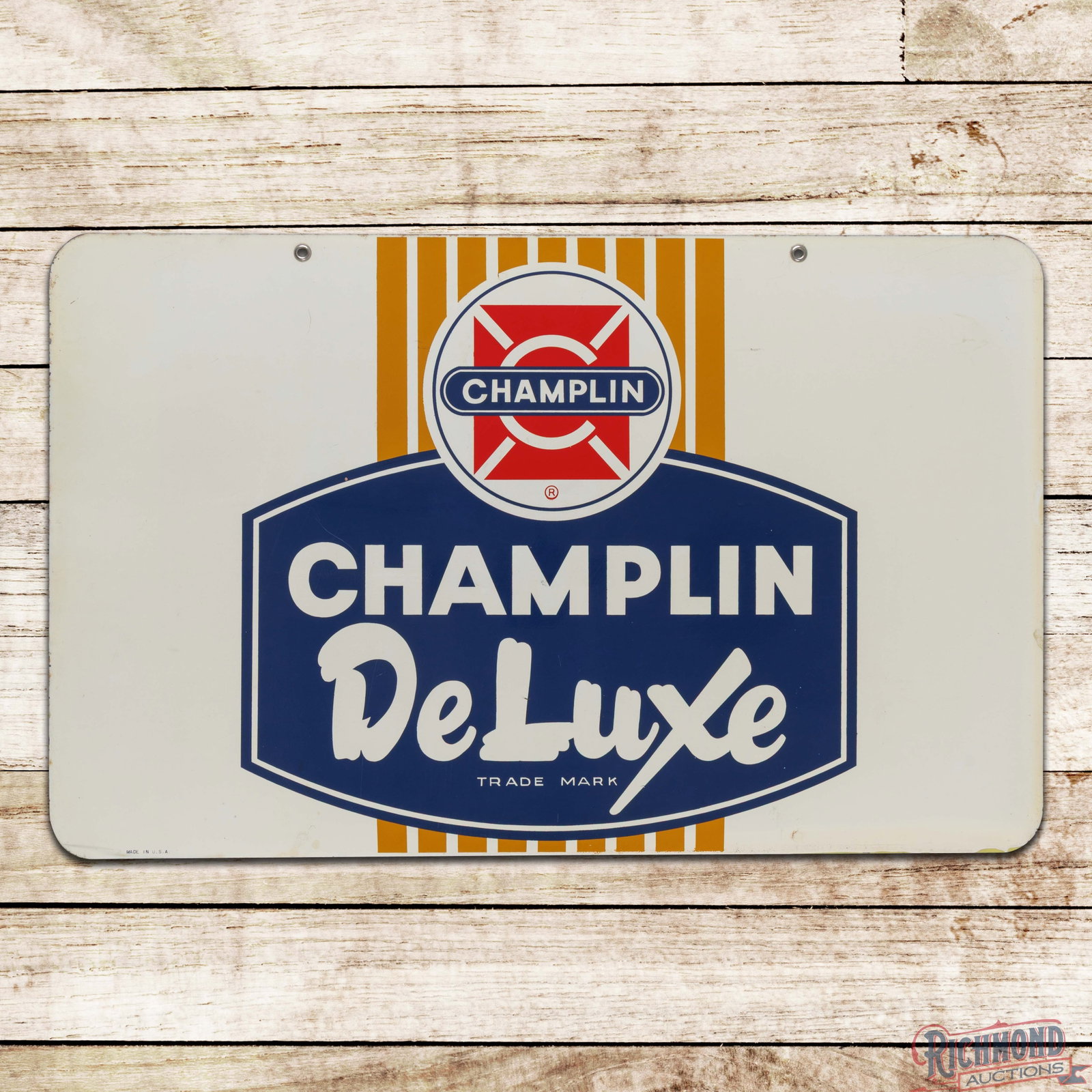 Champlin Deluxe Motor Oil DST Sign w/ Logo: DST sign has excellent color and shine. Side #1 is very clean overall with light wear in the fields. The perimeter has small paint chips, discoloration and factory blemishes along the edges. The rever