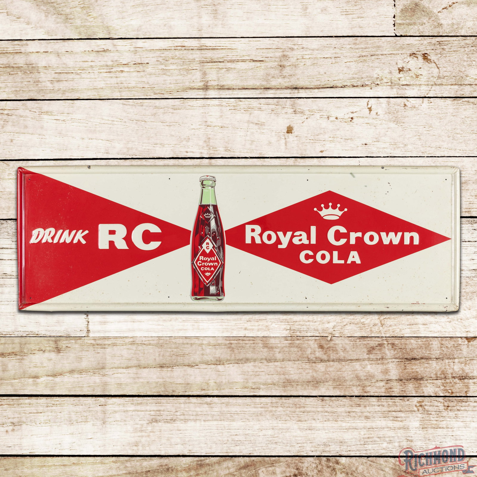 1960 Drink RC Royal Crown Cola Emb. SST Sign w Bottle: SST embossed self-framed sign has very good color and shine. The field has light wear with spotting and oxidation. The perimeter has paint chips with two added mounting holes on the upper self-framed 
