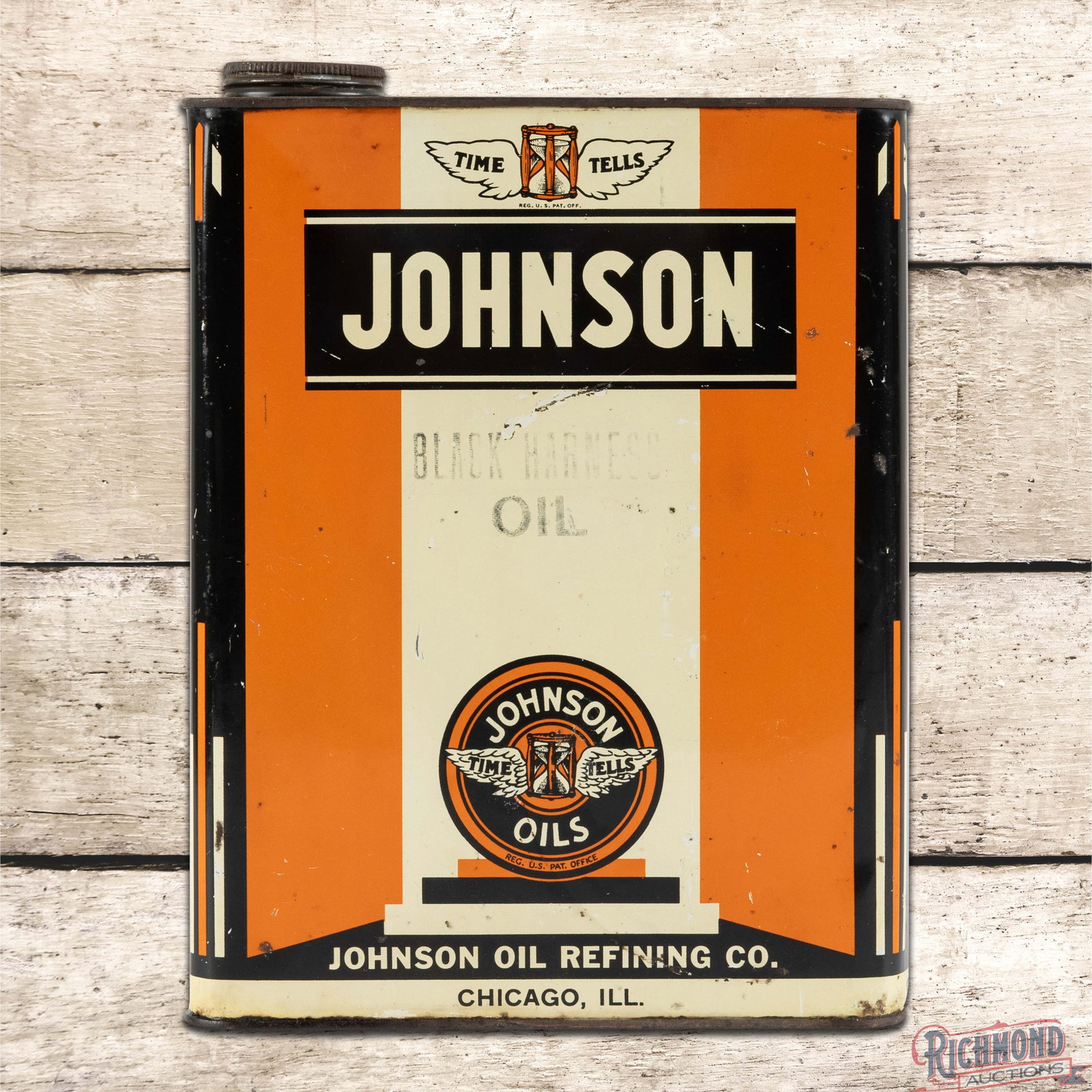 Johnson Oil Refining Co. Empty 1 Gallon Metal Can w/ Time Tells Logo: Empty metal one gallon can with the original cap and handle has excellent color and shine. Side #1 has light wear with small scratches and paint chips. The lower right edge has a minor edge dent prese