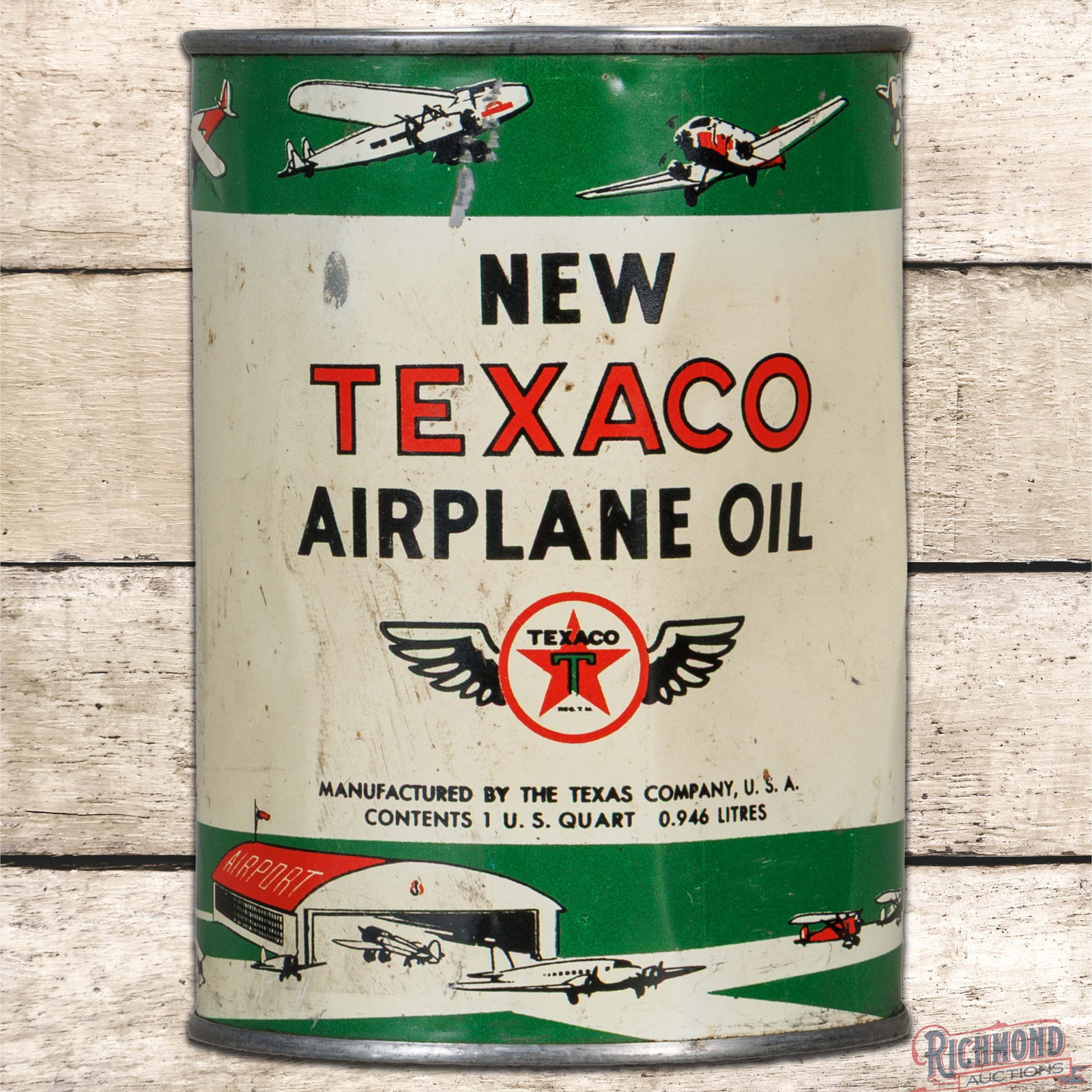 Rare Texaco New Airplane Oil 1 Quart Metal Oil Can FULL w/ Planes: Scarce full metal one-quart can has good color and shine. The display has surface wear with marks, dents, indentations, and small areas of paint loss in the upper fields. The reverse has additional in