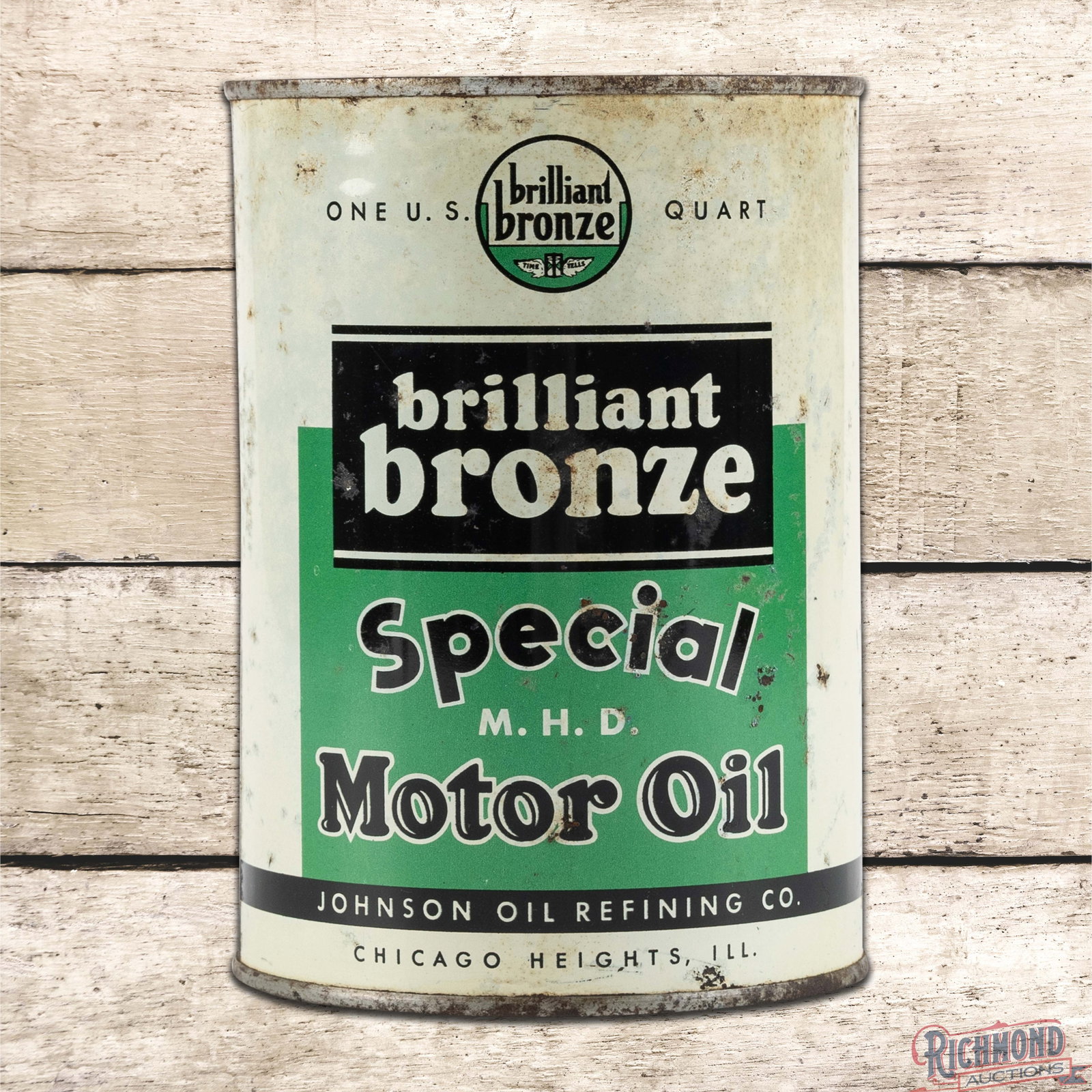 Johnson Brilliant Bronze Special M.H.D. Motor Oil Metal 1 Quart Can: Full metal one quart can has excellent color and shine. Side #1 has a clean field with small scuffs and minor indentations along the edges. The reverse is in a similar condition with a fine scratch to