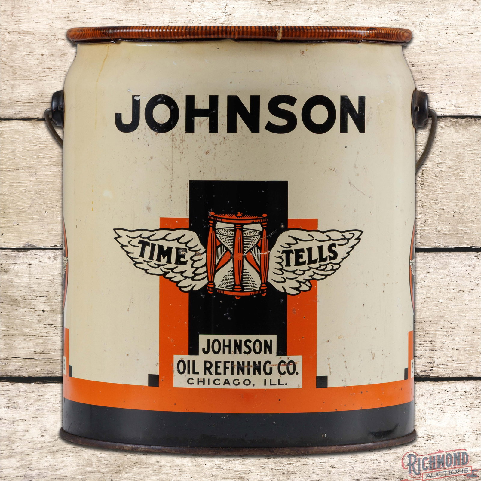 Johnson Oil Refining Co. 5 Gallon Metal Oil Can w/ Logos: Five gallon metal can with the original handle and cap has very good color and shine. The can retains product on the inside. The display has light wear throughout with marks, fine scratches and spotti