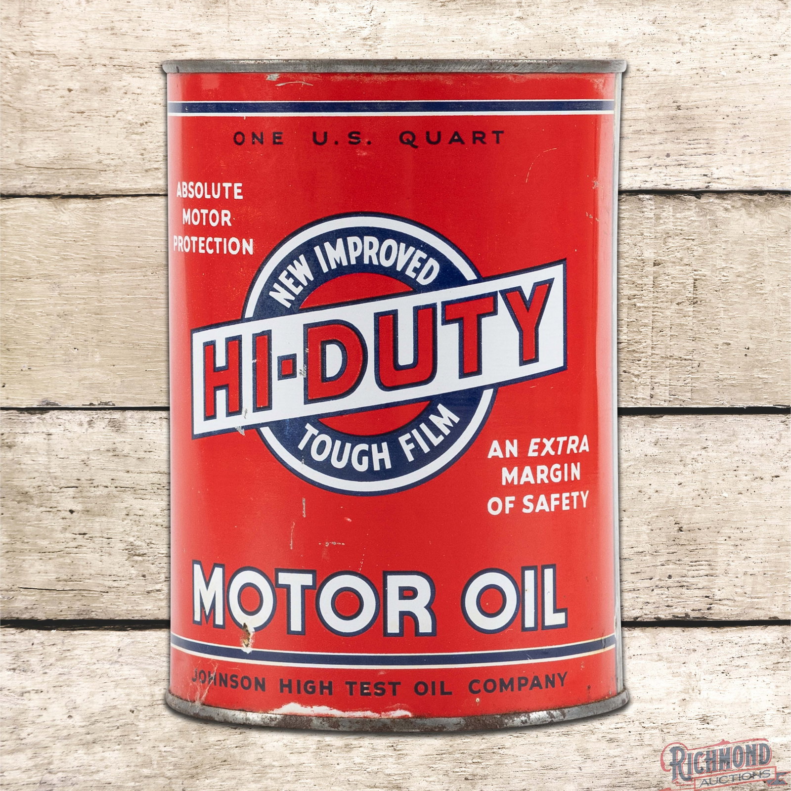 Johnson High Test "Hi-Duty" Motor Oil Metal 1 Quart Can: Empty metal one quart can has excellent color and shine. Side #1 has a small paint chip below the "O" in Motor, scratches in the right outer fields and discoloration along the lower edge. The reverse 
