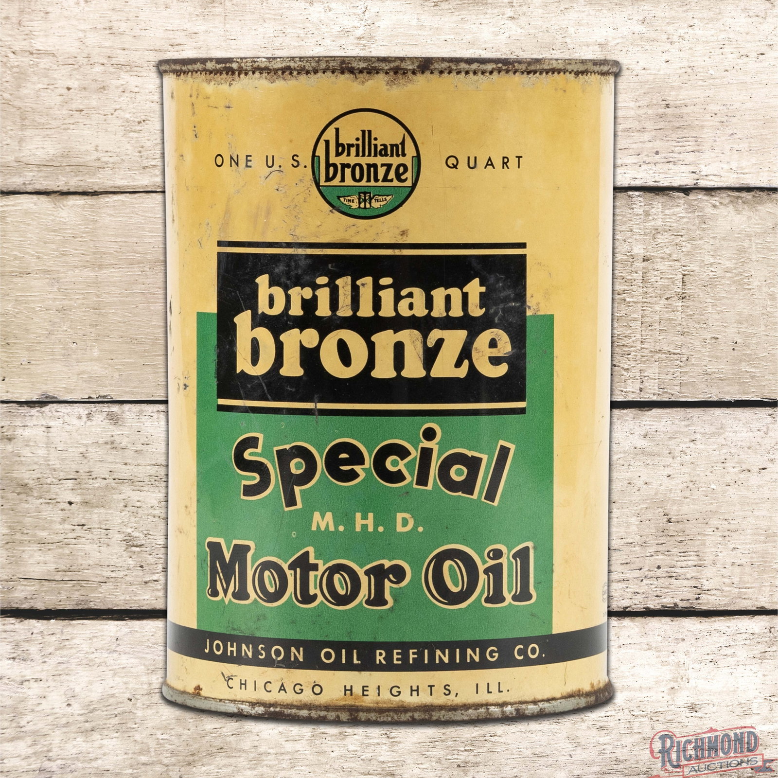 Johnson Brilliant Bronze Special Motor Oil Metal 1 Quart Can: Empty metal one quart can has good color and shine. Side #1 has toning with fine scratches and areas of discoloration. The reverse has additional surface wear and the upper lid is missing. 5.5" H. Con