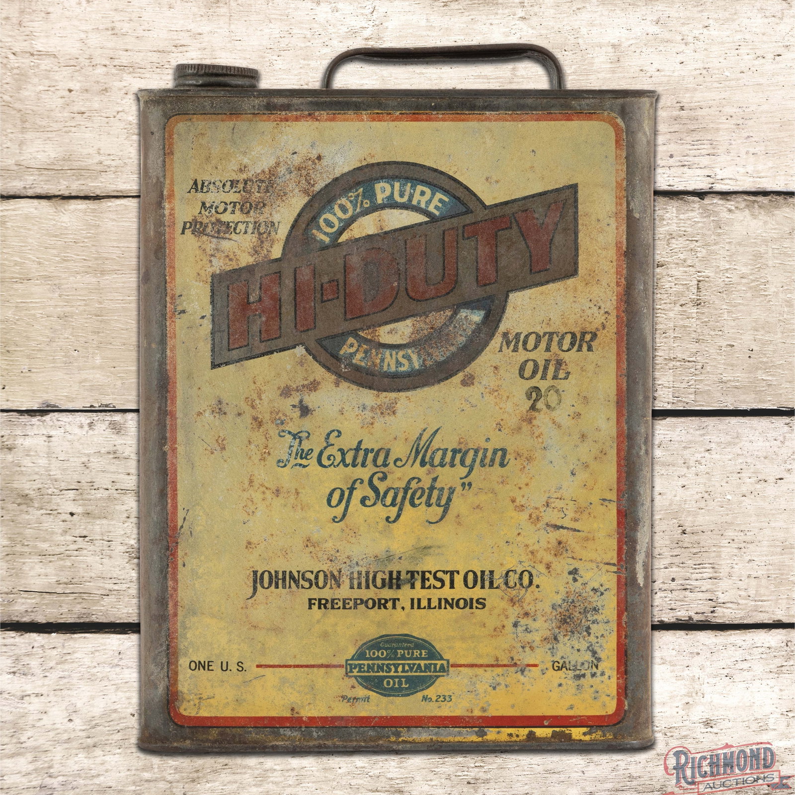 Johnson Hi-Duty Motor Oil Empty 1 Gallon Metal Can Freeport Illinois: Empty metal one gallon can with the original handle and cap has moderate color and shine. The display has surface wear with wash and minor fine scratches. The perimeter has an indentation on the upper