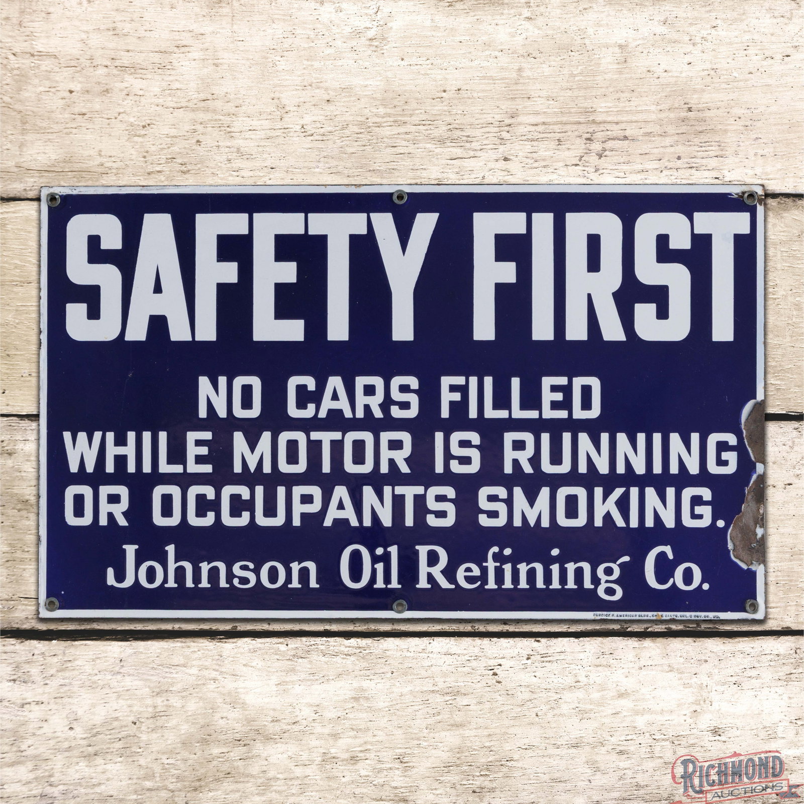 Rare Safety First Johnson Oil Refining Co SSP Sign: SSP sign has excellent color and gloss. The field has minor surface imperfections. The perimeter has chipping along the right hand edge and upper right mounting hole. All six factory grommets are pres