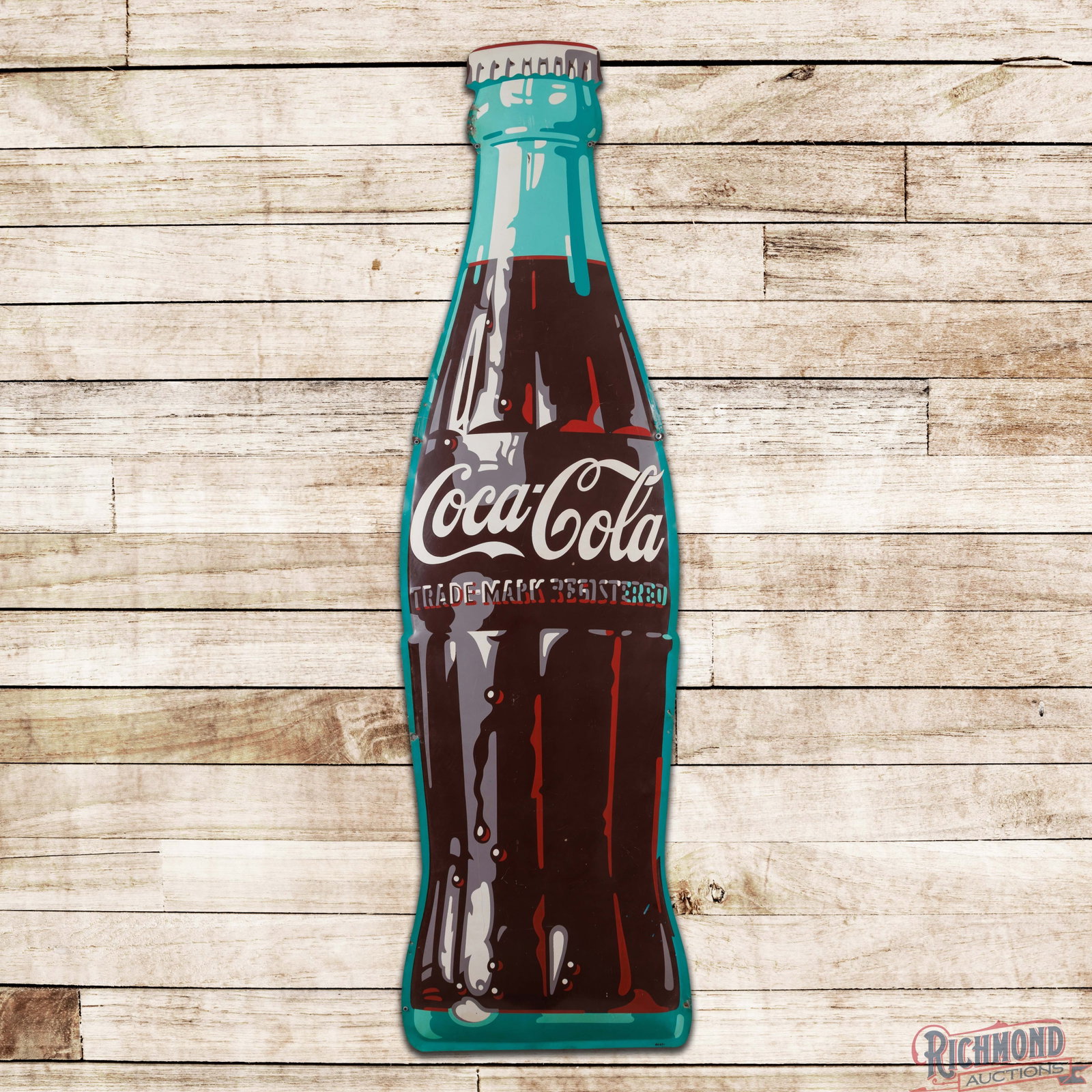 Coca Cola 9' SST Convex Bottle Sign: SSP convex sign has very good color and shine. The field has small paint chips, fine scratches and light wear. The perimeter has edge wear, enlarged mounting holes, and minor oxidation. The sign is mo