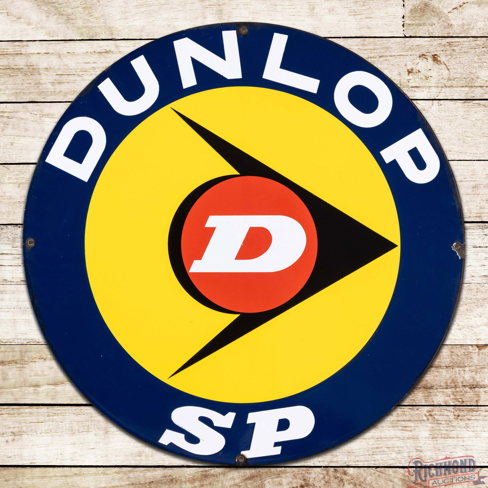 Dunlop SP Tires 27.5" DSP Sign w/ Logo: DSP sign has excellent color and gloss. Side #1 has a clean field with small chips and discoloration along the edges. The reverse has light wear with a chip at the 3 o'clock mounting hole. All four fa
