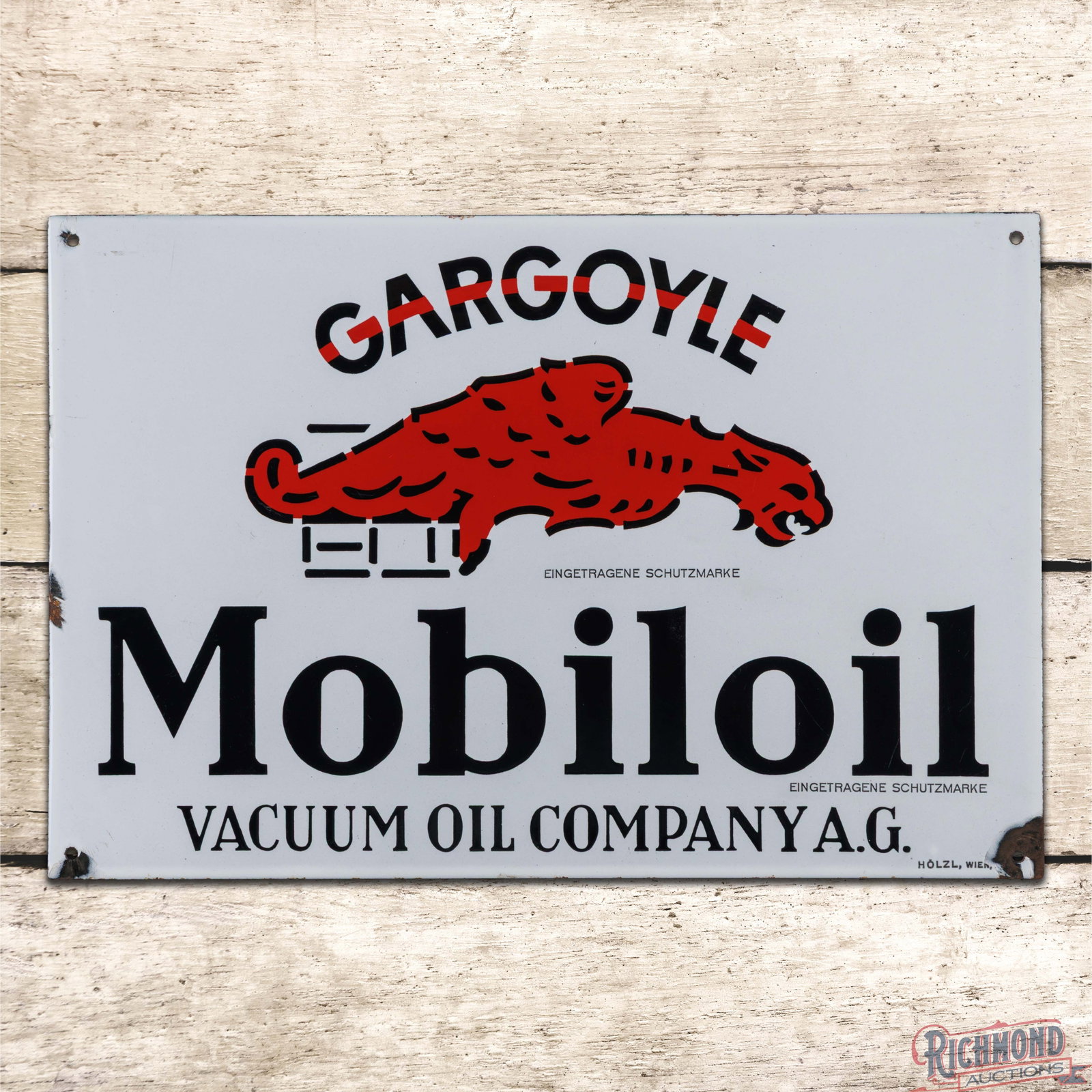 Gargoyle Mobiloil Vacuum Oil Company A.G. 24" SSP Sign: SSP sign has outstanding color and gloss. The fields are clean. The perimeter has at the left-hand edge and the lower corners. Marked Eingetragene Schutzmarke, Holzl, Wien. Overall a clean seldom-seen