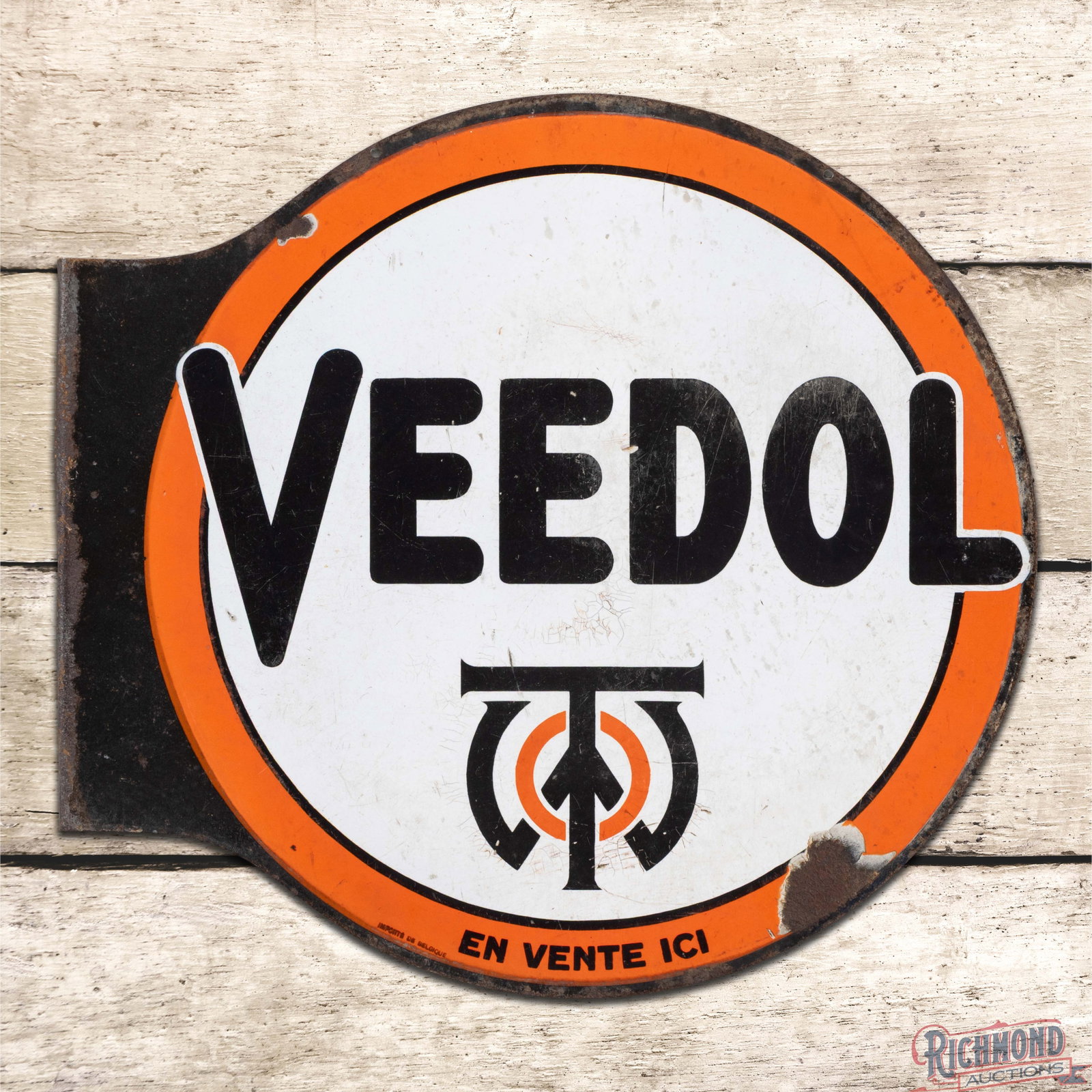 Veedol Motor Oils DSP Flange Sign w/ Logo: DSP flange has good color and gloss. The display has surface wear with crazing in the fields. The perimeter has wear with chips along the upper right edges. The reverse has additional wear with bends 