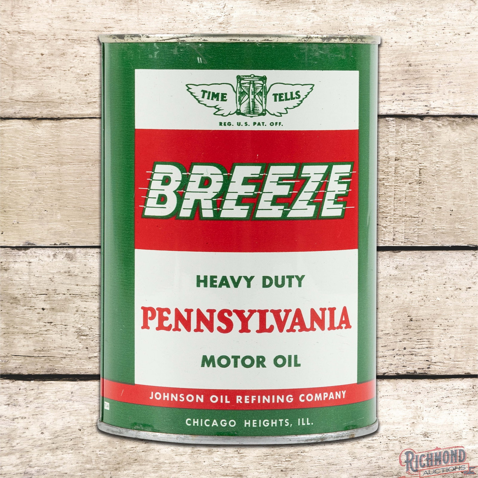 Johnson Breeze Pennsylvania Motor Oil Metal 1 Quart Can FULL: Empty metal quart can has good color and shine. The display has general surface wear with oxidation and paint chips in the outer fields and edges. The reverse has additional wear in the fields and bot
