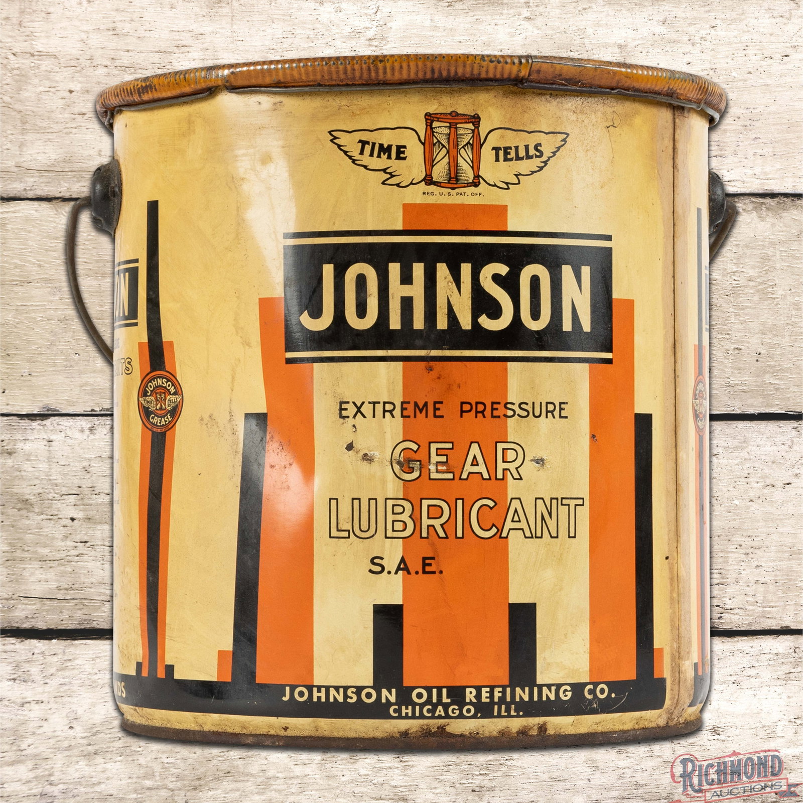 Johnson Gear Lubricant 25 Pound Metal Grease Can w/ Logo: Metal 25 pound grease can with the original handle and cap has good color and shine. The can has a small amount of product inside. The display has toning with light wear and fine scratches. The sides 