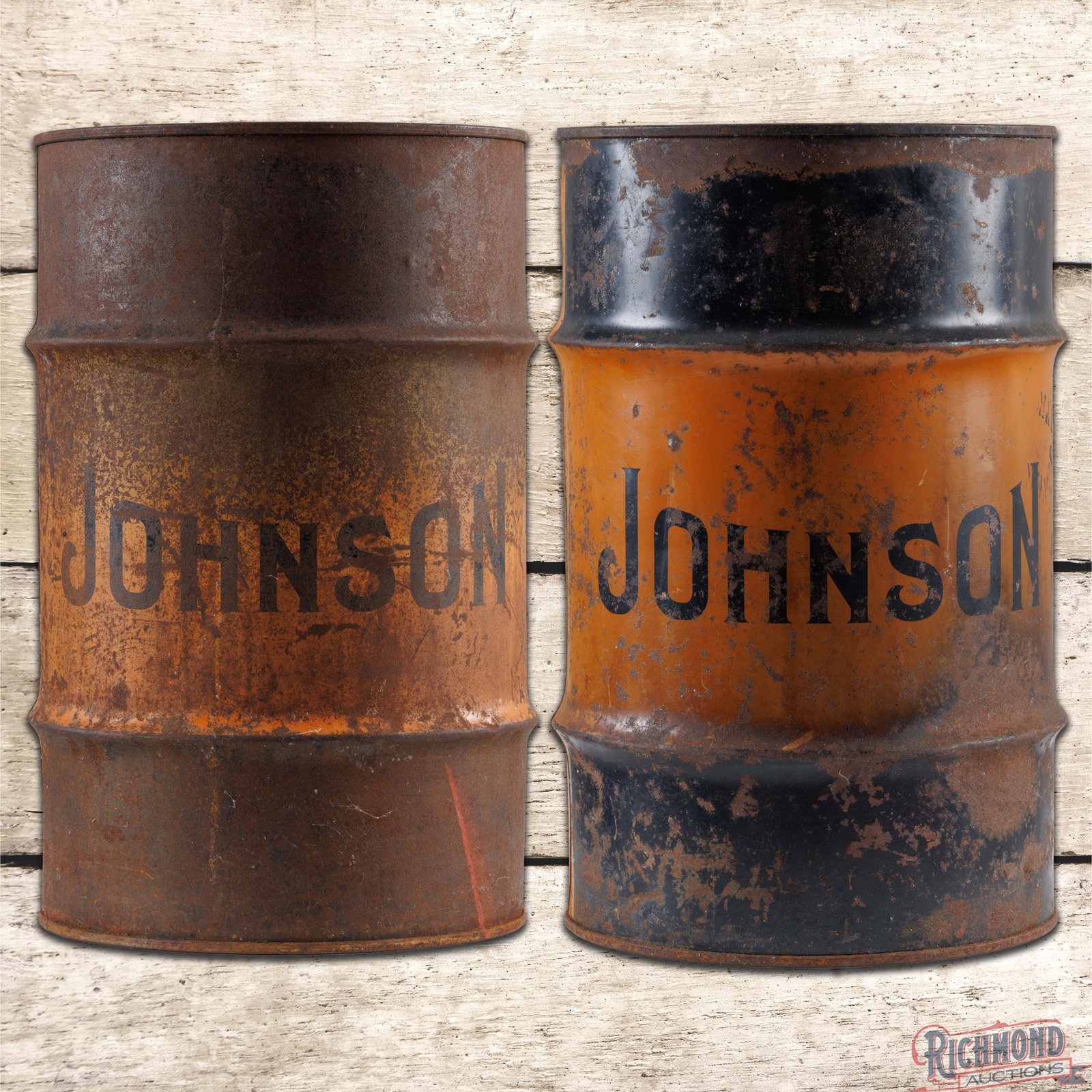 Two Johnson Oil Refining Co. 25 Gallon Oil Drum Barrells w/ Logos: Two empty Johnson 25-gallon metal oil barrels. Both of the cans feature a large Johnson logo in the field. The cans exhibit general wear with oxidation, scratches, paint loss and the lids are missing 