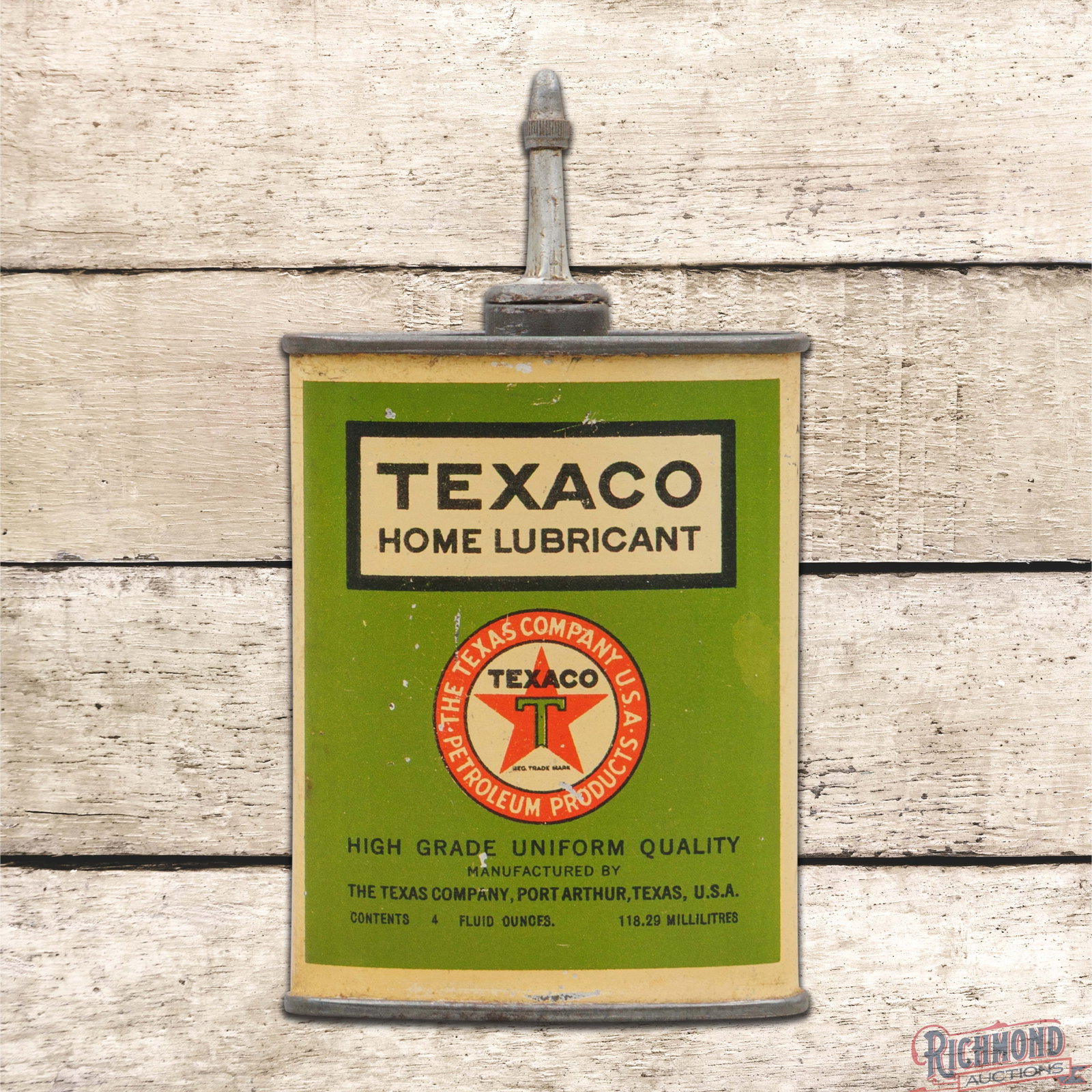 Texaco Home Lubricant Empty 4 Ounce Metal Lead top Handy Oiler Can: Empty four ounce metal lead top handy oiler can has very good color and shine. The display has tiny paint chips with toning and faint bends. The reverse has slightly more wear than the display. The ca