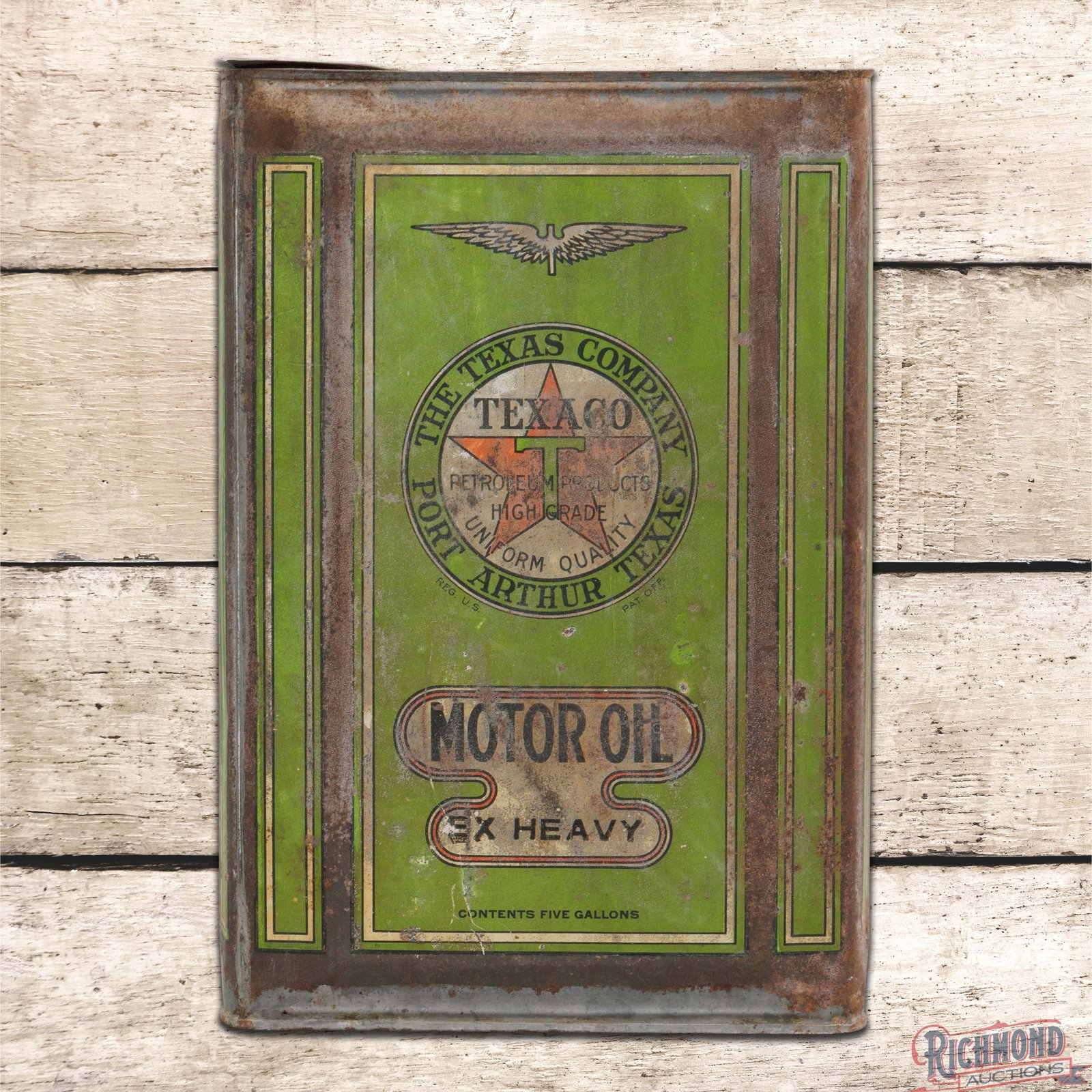 Early The Texas Company Texaco 5 Gallon Empty Metal Can "Port Arthur Texas": Empty five-gallon metal can with the original handle and cork cap has good color and shine. The display has wash with surface wear and oxidation. The reverse and sides have heavier wear. All in all a 
