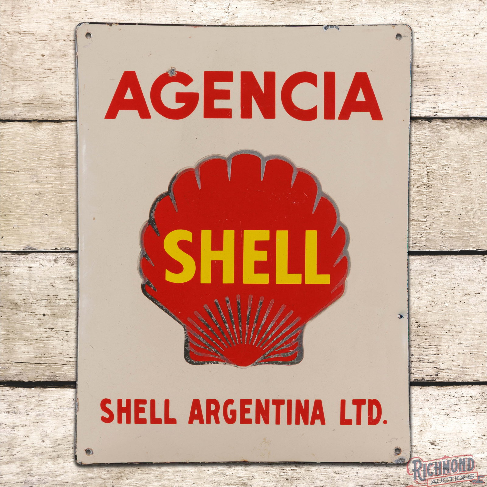 Agencia Shell Argentina Ltd. SSP Convex Sign w/ Logo: SSP pillow sign has good color and gloss. The field has fine scratches with wear and loss to the black porcelain enamel in the logo. The upper field has a small chip in the "G" with other chips along 