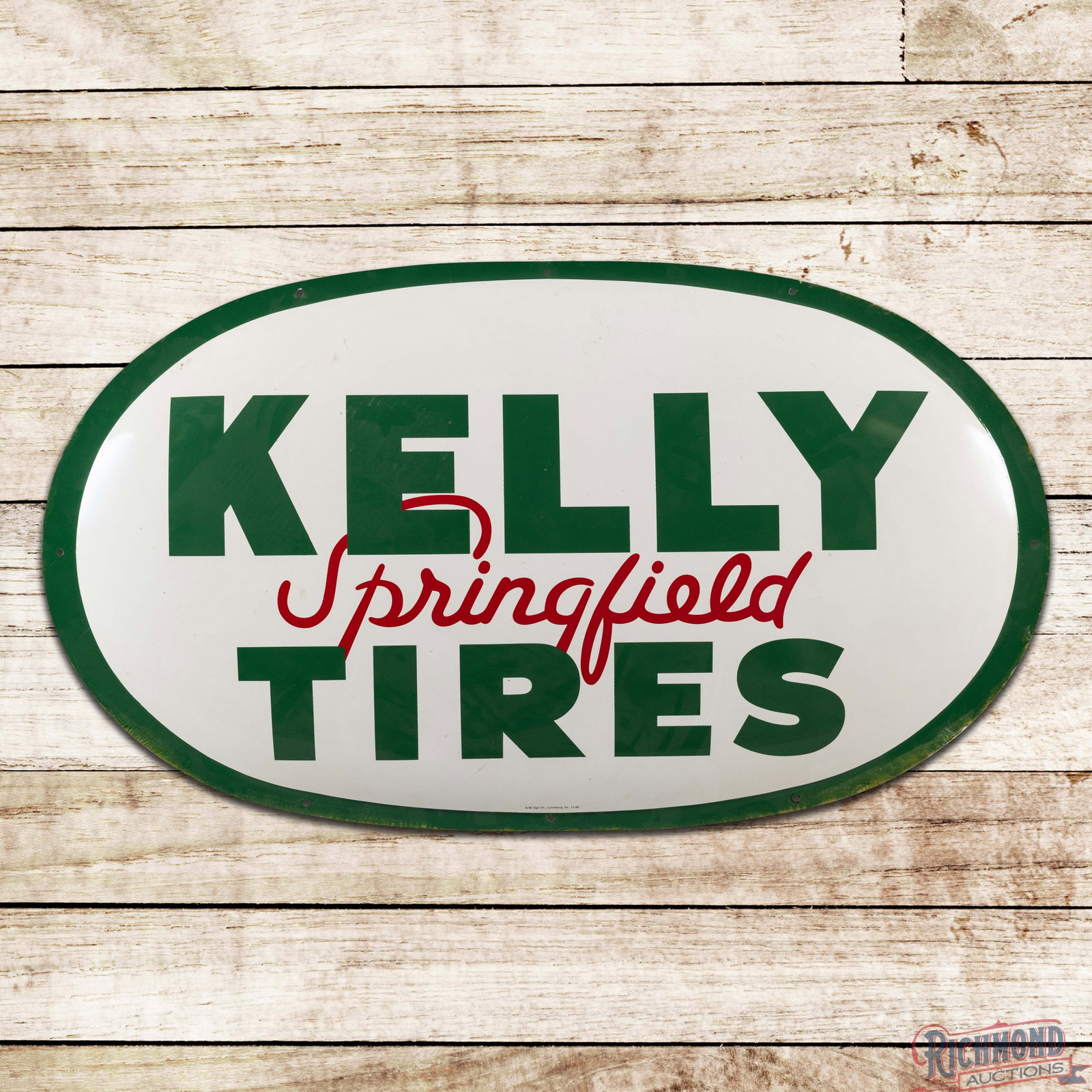 1956 Kelly Springfield Tires SST Bubble Sign: SST bubble sign has excellent color and shine. The display has minor surface imperfections with a scuff on the lower edge of the "R" in Tires. The perimeter has light wear with discoloration along the