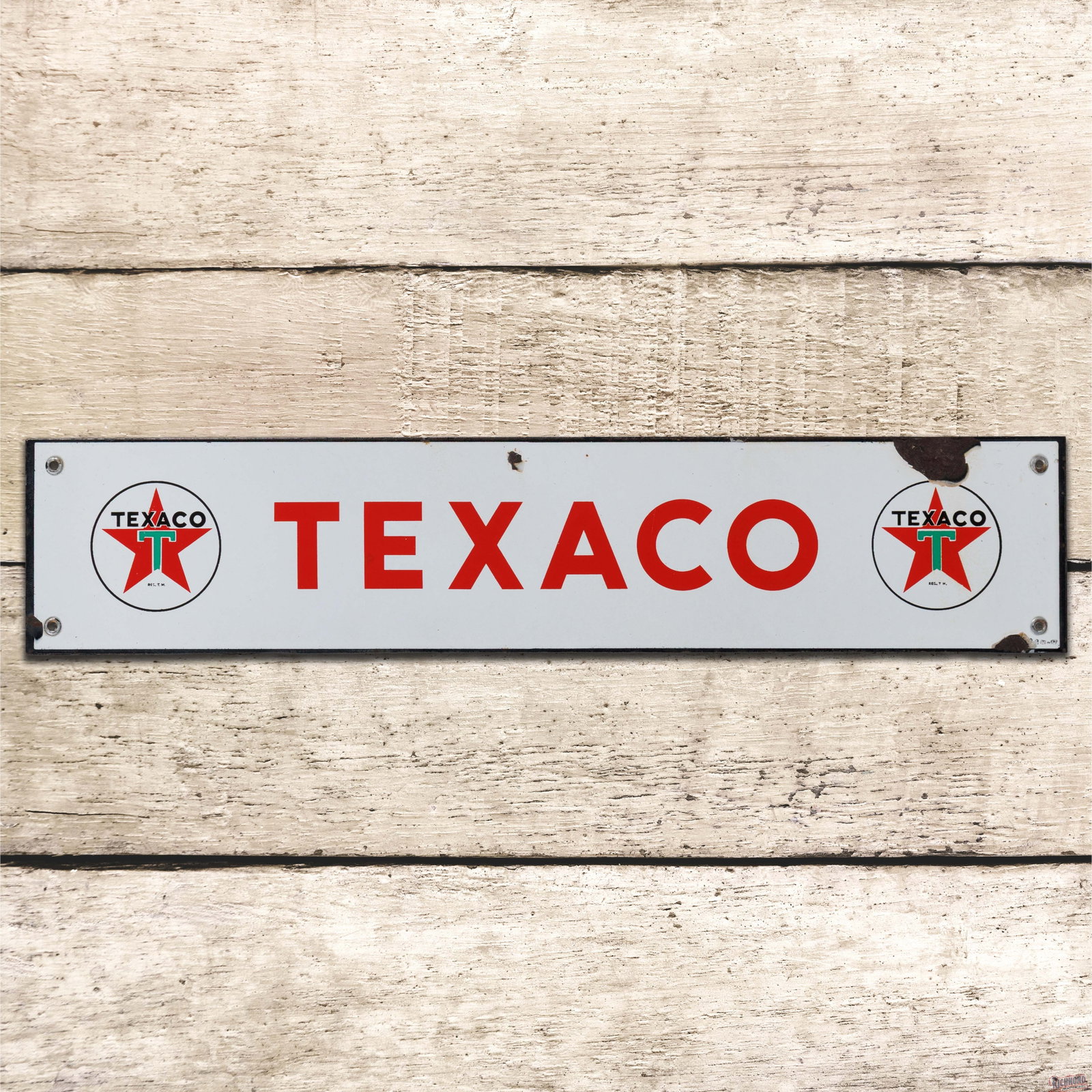 Texaco Gasoline Motor Oils 24" SSP Sign w/ Logo "White T": SSP sign has very good color and gloss. The display has light wear with faint cloudiness to the white porcelain enamel and chips in the upper fields. The perimeter has a large chip on the upper right 