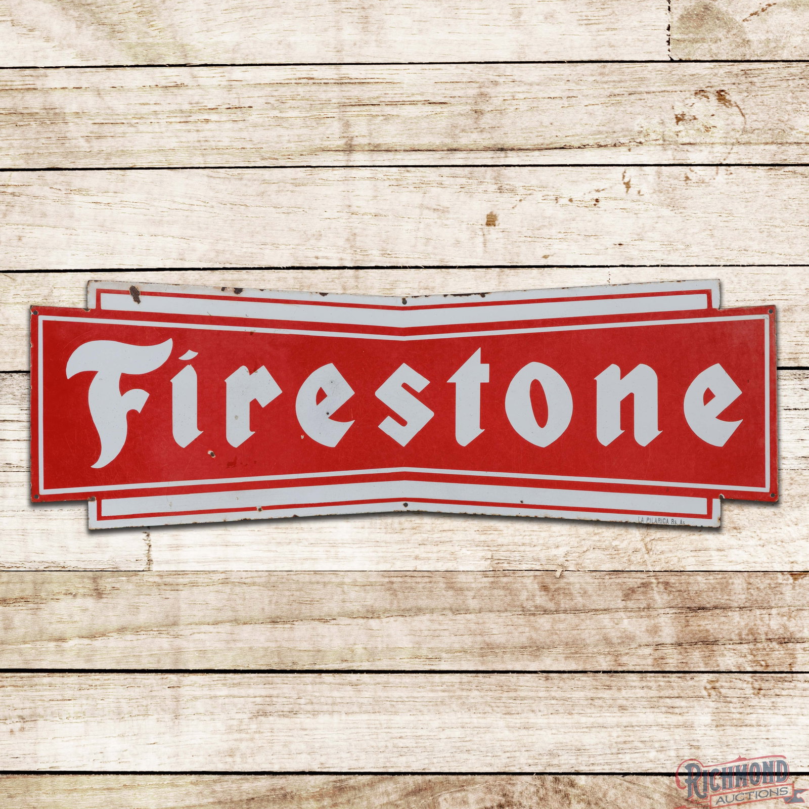 Firestone Tires 3' Horizontal Die Cut SSP Sign: SSP die cut sign has good color. The display has cloudiness with fine scratches and small chips. The perimeter has minor discoloration with small chips along the outer edges. Marked La Pilarica Bs. As