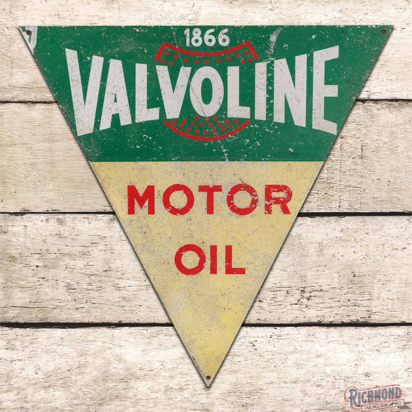 Valvoline Motor Oil SST Logo Sign: Single sided metal sign has moderate color and shine. The display has paint chips, fading and a scratch through the upper lettering. The perimeter has similar wear with minor bends at the corners. All