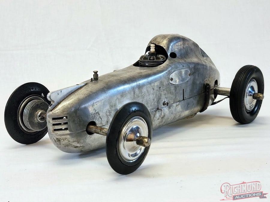1940 Champion Speedway Tether Car: This car was designed and built by Bill Atwood of Champion Products, Los Angeles, California in 1940. This car is a true survivor with all of the original internal components still intact. This is a r