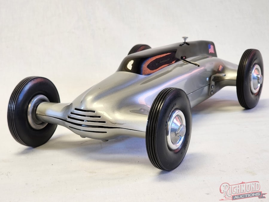 1941 Rexner Zipper: Built by J.R Gardner Co. and designed by Zip Grandell. This car was die formed out of .085 Aluminum. Powered by a Super Cyke spur drive engine. This car is compete with coil, condenser, batteries, and