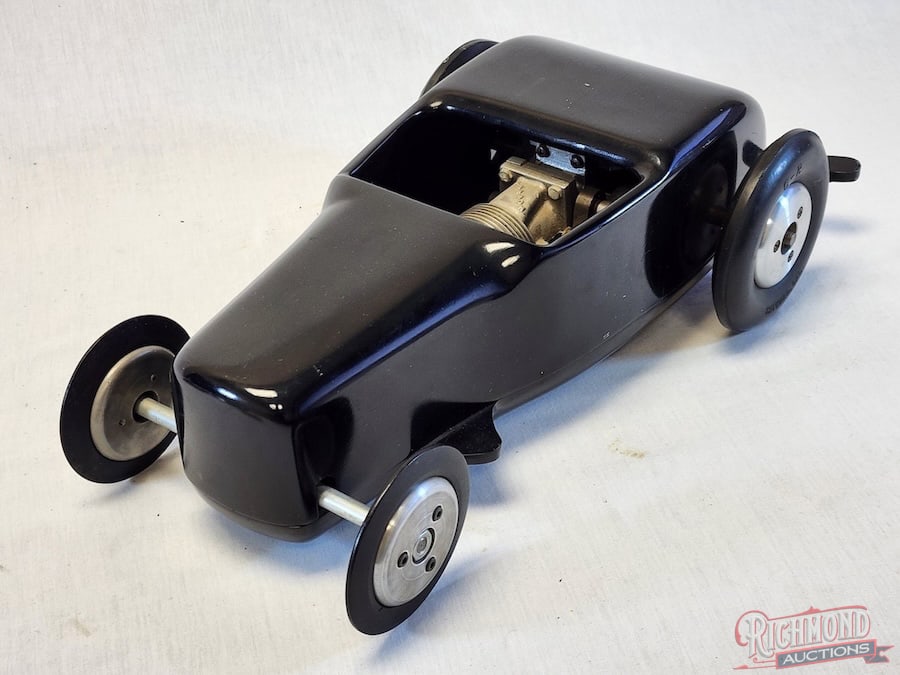 1947 Roadrunner Hot Rod Tether Car: This car was produced by Ed's Specialty Company of Bell, California in 1947. This Roadrunner is powered by a Hornet motor, equipped with a high compression Red Head. The engine/spur gear driveline bra