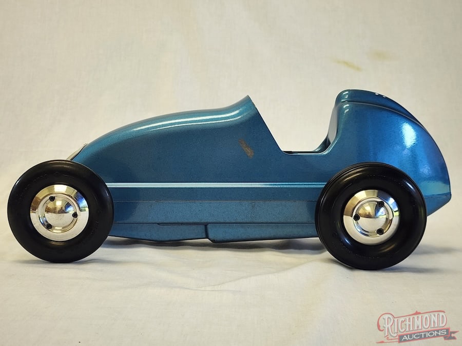 1946 Dooling F Tether Car: This sixth car of the Dooling series was patterned after the Kurtis Kraft midget of the day. The body and pan are magnesium. The car comes with a bevel gear gearbox with is in place. This car is
