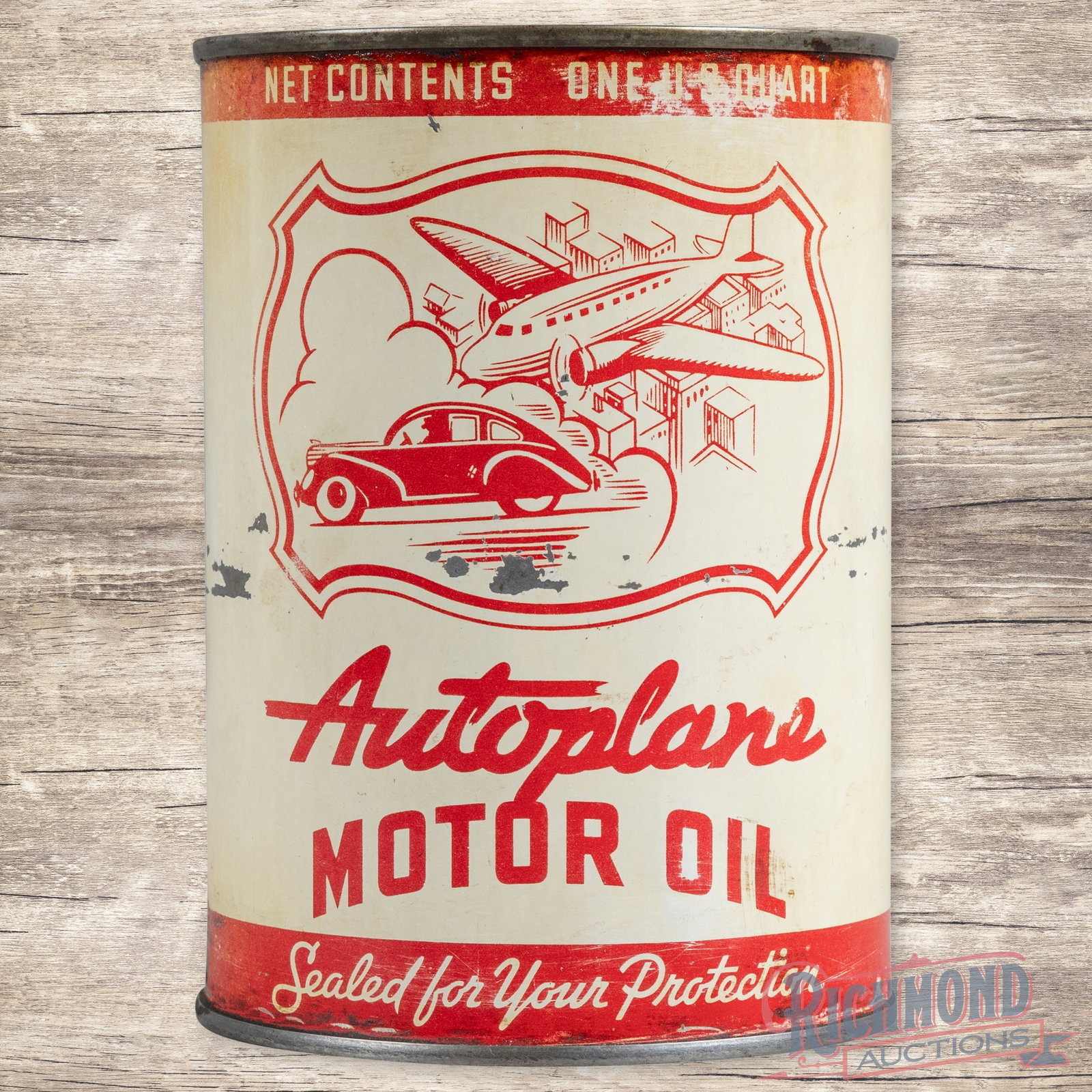 Autoplane Motor Oil Metal 1 Quart Can w/ Airplane & Automobile: Empty metal one quart can has good color and shine. The display has paint chips in the fields with slight toning to the white painted areas. The outer edges have small paint chips, light wear and wash