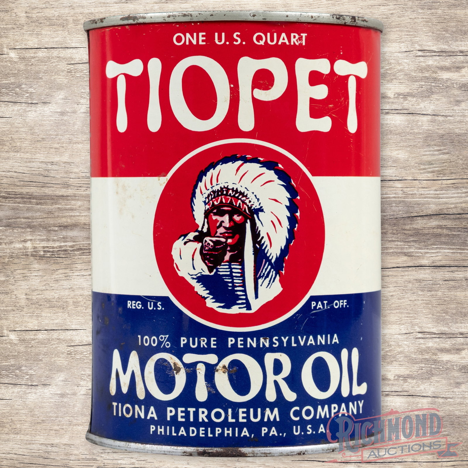 Tiopet Motor Oil Metal 1 Quart Can w/ Native American Chief: Empty metal one quart can has excellent color and shine. The display has small areas of discoloration in the fields with light surface wear. The perimeter has small paint chips with a small rim dent o