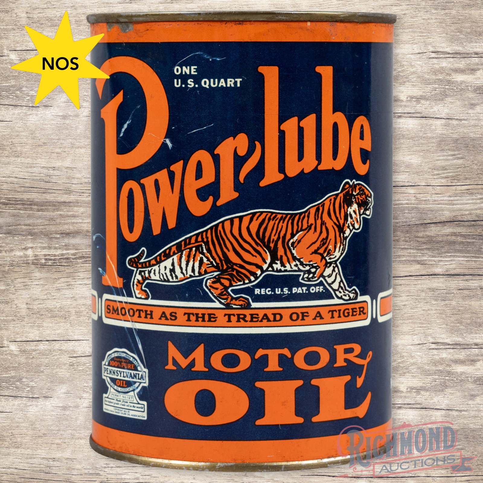 NOS Powerlube Motor Oil Full 1 Quart Metal Can w/ Tiger Denver Colorado: Full metal one quart can has excellent color and shine. The display has tiny scuffs in the field with scratches and wear in the outer fields. The "P" in Powerlube has an indentation that proceeds to t