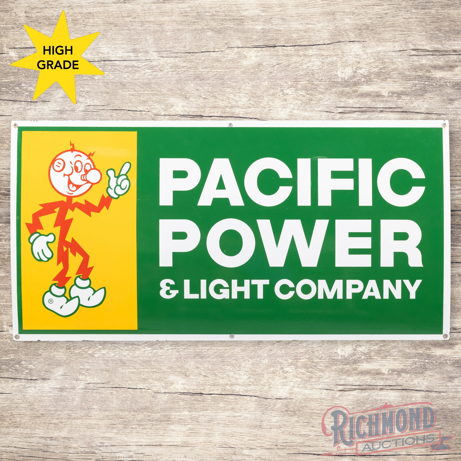 Pacific Power & Light Company 4' Single Sided Porcelain Sign w/ Reddy Kilowatt: SSP (single sided porcelain) sign has excellent color and gloss. The field has light surface wear with minor marks. The perimeter has small chips along the outer edges. All six factory grommets are pr