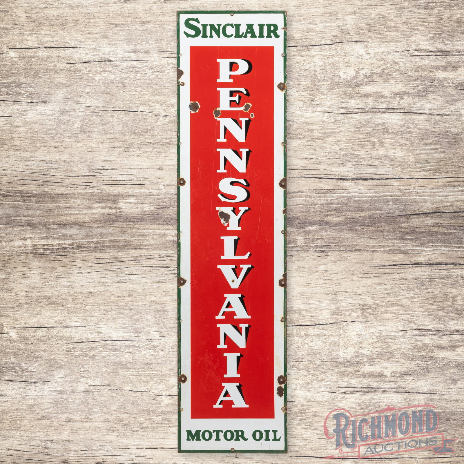 Sinclair Pennsylvania Motor Oil 5' Single Sided Porcelain Sign: SSP (single sided porcelain) sign has very good color and gloss. The field has chips with vertical fine scratches and areas of minor cloudiness to the red porcelain enamel. The perimeter has added mou