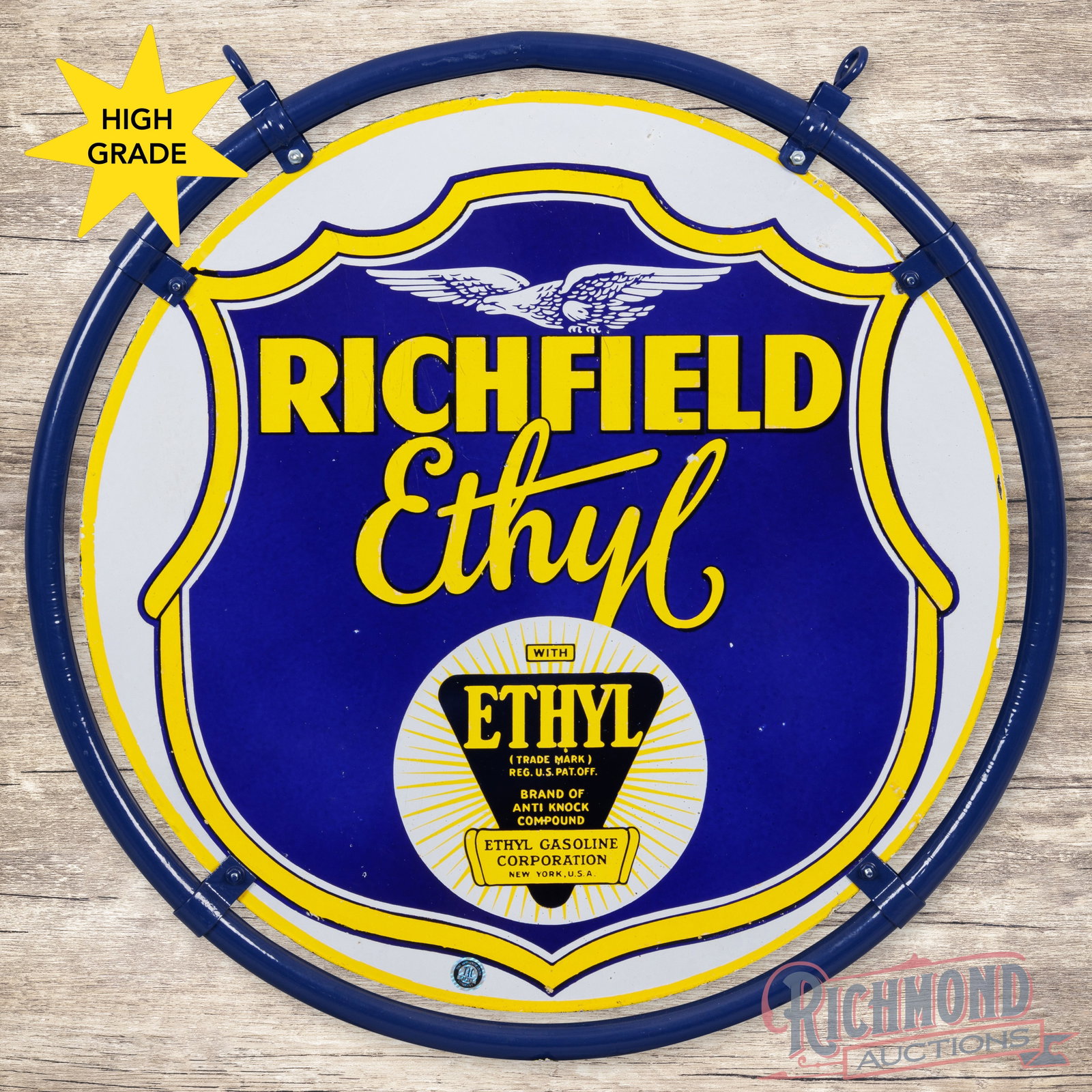 Richfield Ethyl Gasoline 25" Double Sided Porcelain Logo Sign w/ Ring: DSP (double sided porcelain) sign with the original ring has excellent color and gloss. The display has a clean field with two tiny chips in the right outer fields. The perimeter has a small chip at t