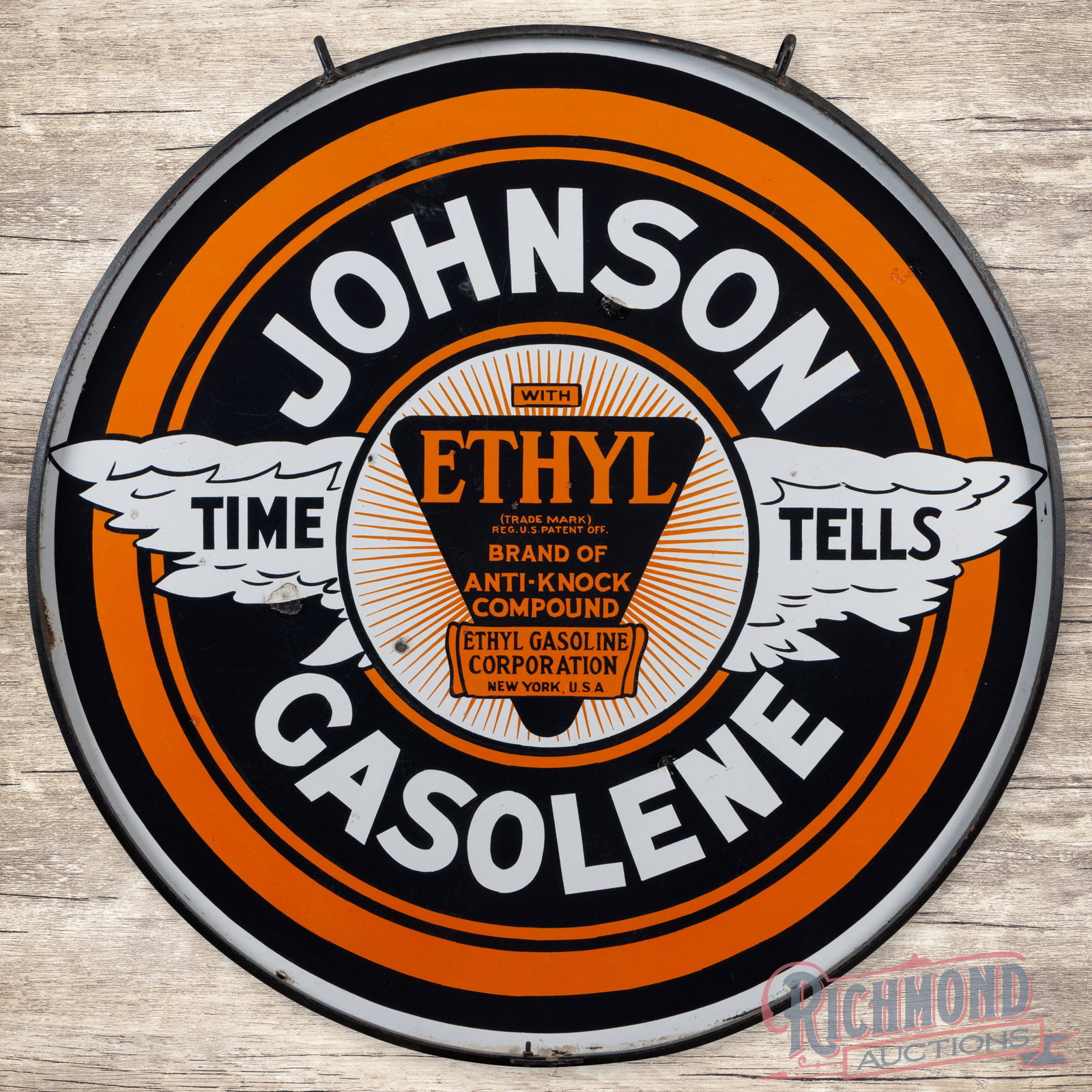 Johnson Time Tells Motor Oil Ethyl Gasoline 48" Double Sided Porcelain Sign w/ Ring: DSP (double sided porcelain) sign with a metal ring has very good color and gloss. The display has light wear with small chips and areas of minor color match. The outer fields have faint cloudiness an