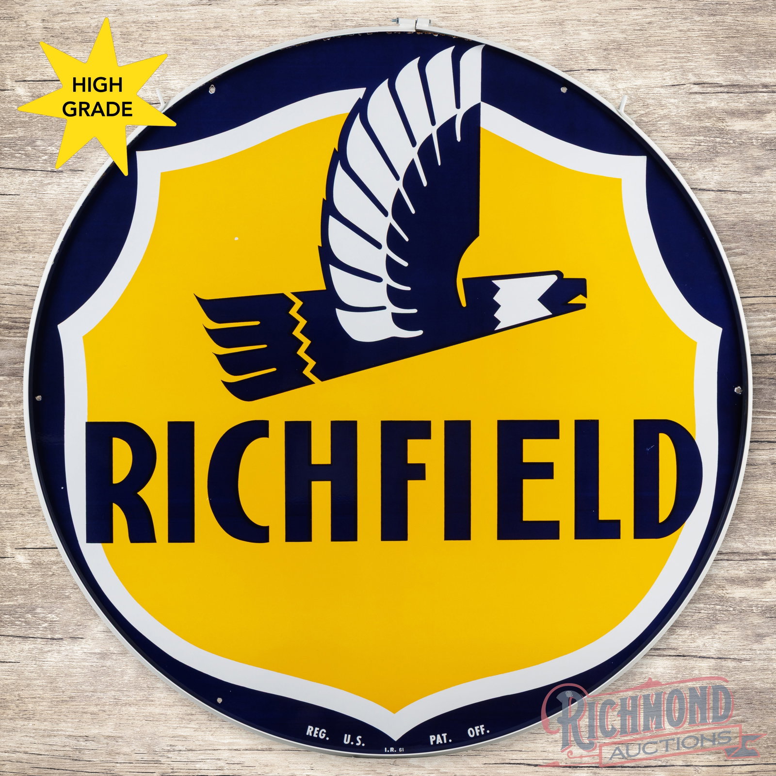 1961 Richfield Gasoline 5' Double Sided Porcelain Sign w/ Ring "Eagle Logo": DSP (double sided porcelain) sign with a metal ring has outstanding color and gloss. The display is exceptionally clean with a tiny flake in the left outer field. The perimeter has small chips that ar