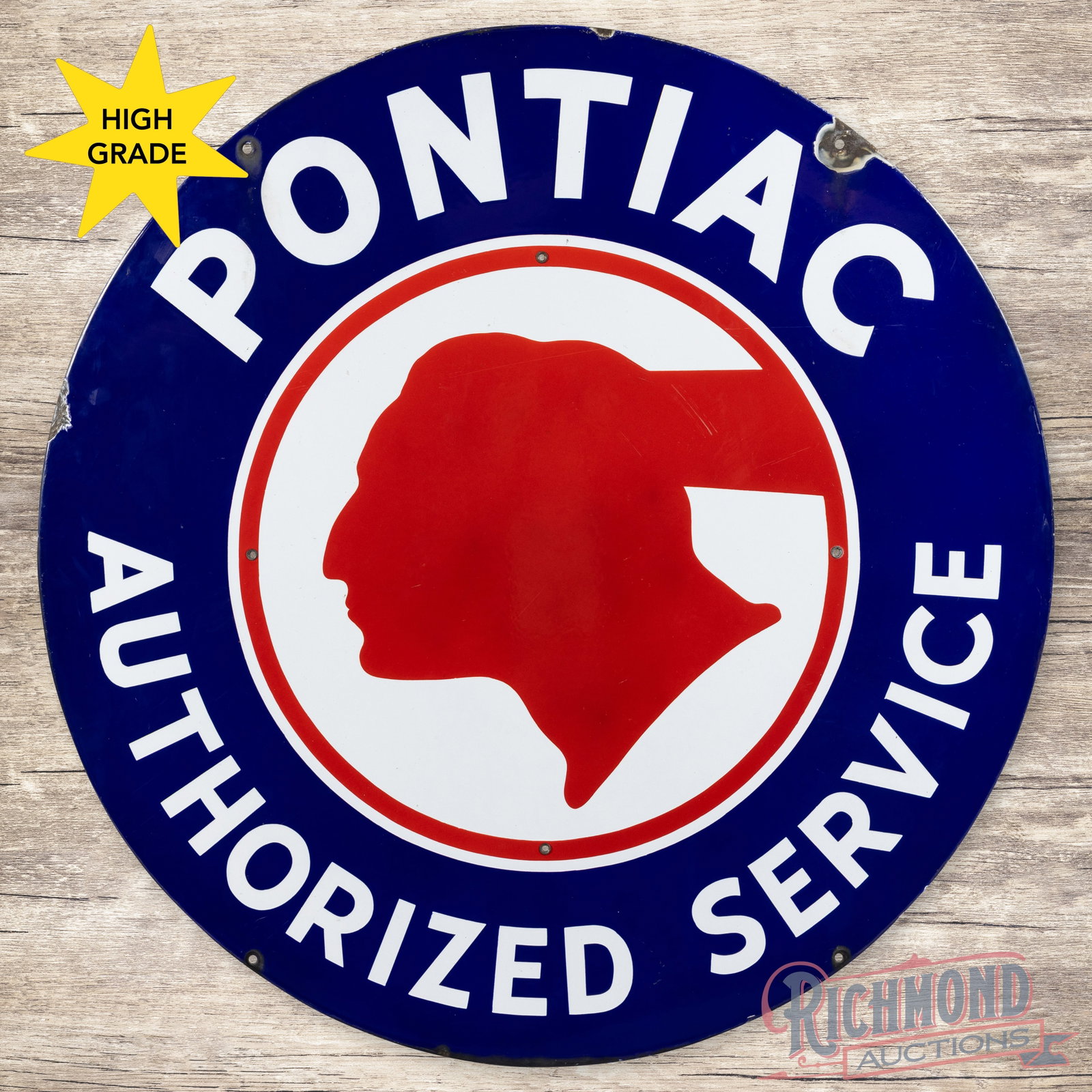 Pontiac Authorized Service 42" Single Sided Porcelain Sign w/ Native American Logo: SSP (single sided porcelain) sign has excellent color and gloss. The display is very clean overall with a few fine scratches in the right fields. The perimeter has a chip at the upper right hand mount