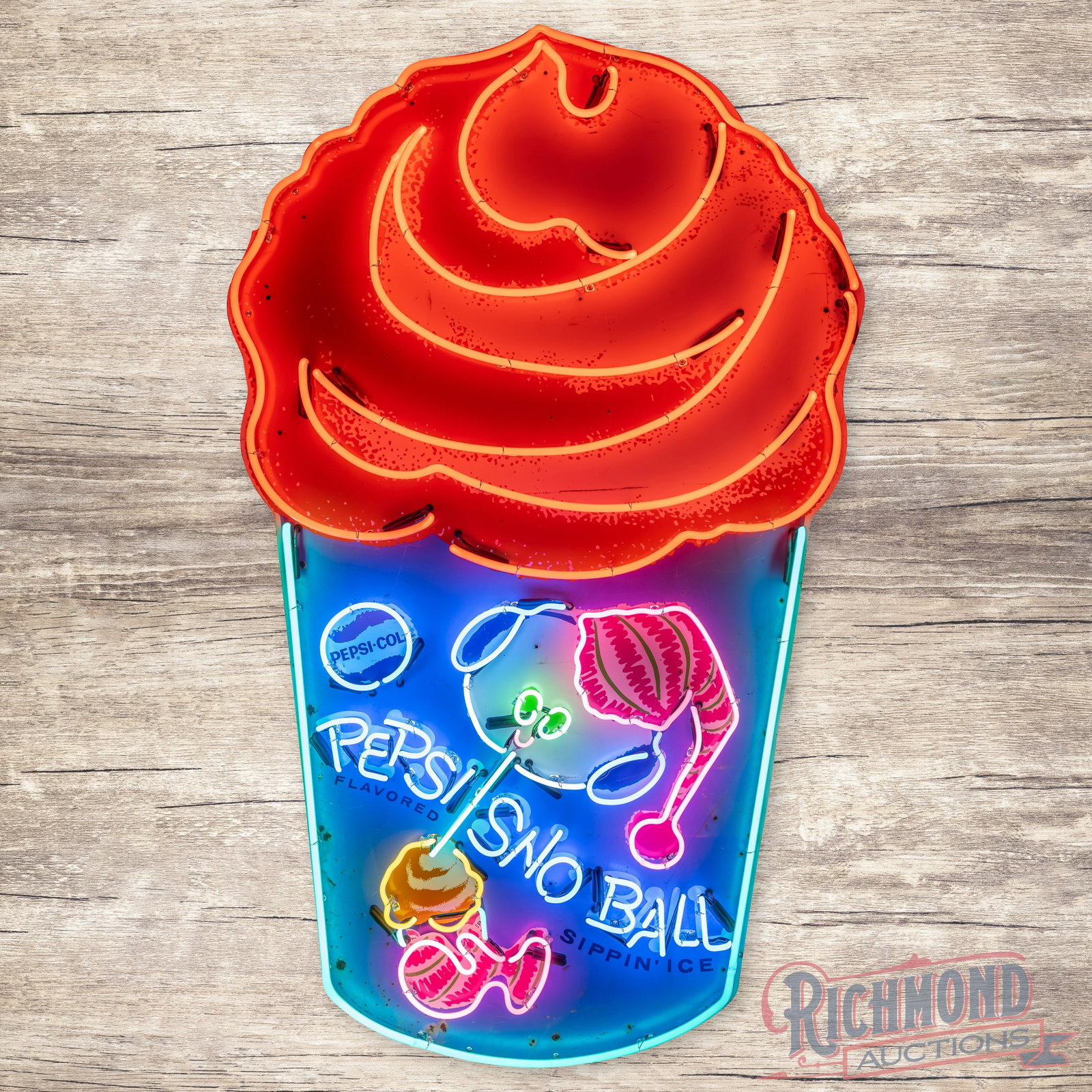 Pepsi Sno Ball Sipping Ice Single Sided Tin Neon Sign: Rare Pepsi Sno Ball Sipping Ice SST (single sided tin) Sign with added neon. A great looking die cut sign that shows nice color with moderate storage wear and light scratching. When lit up it displays