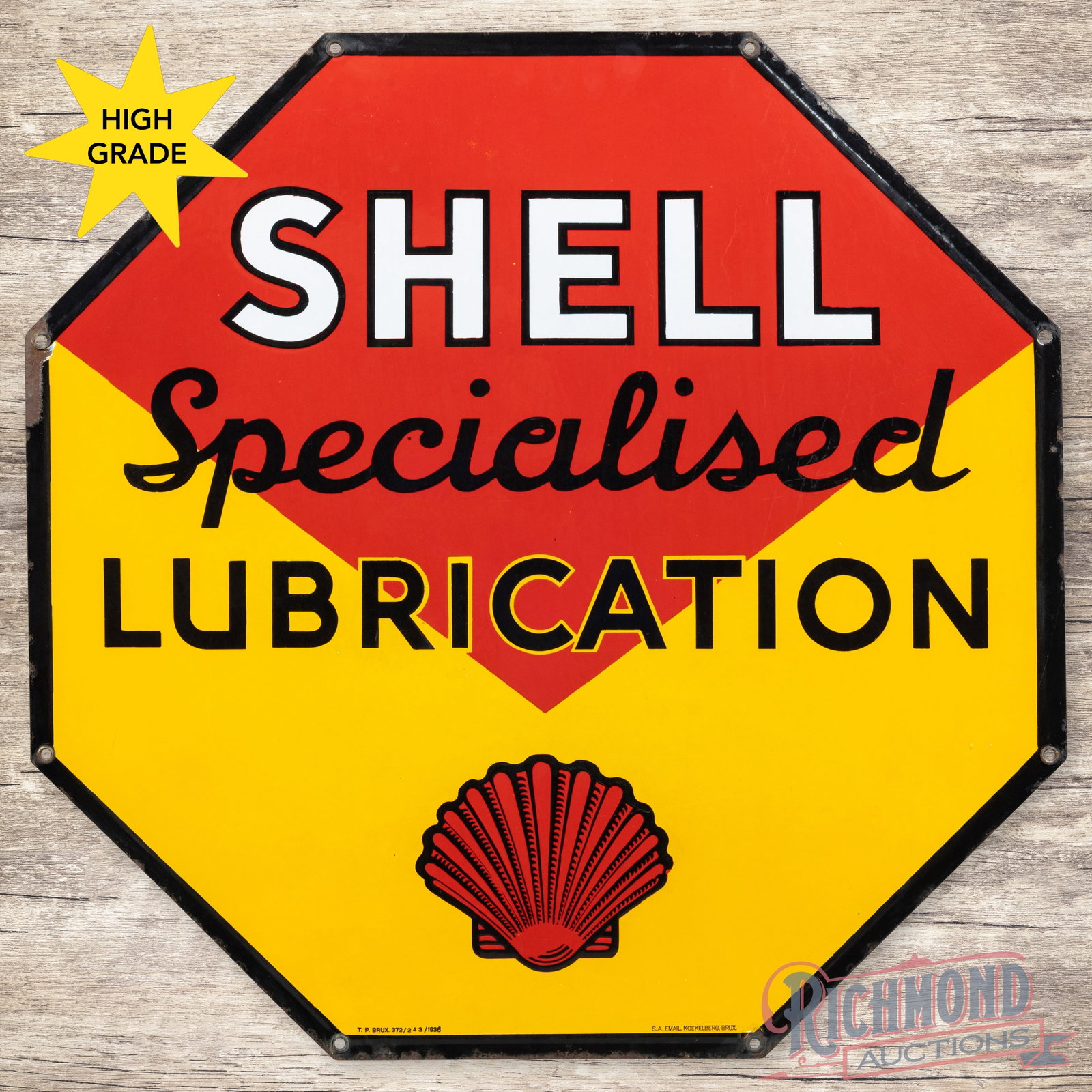 Shell Specialized Lubrication 30" Octagon Single Sided Porcelain Sign w/ Logo: SSP (single sided porcelain) die cut sign has outstanding color and gloss. The fields are exceptionally clean with a few minor surface imperfections. The perimeter has chips along the outer edges. Sev