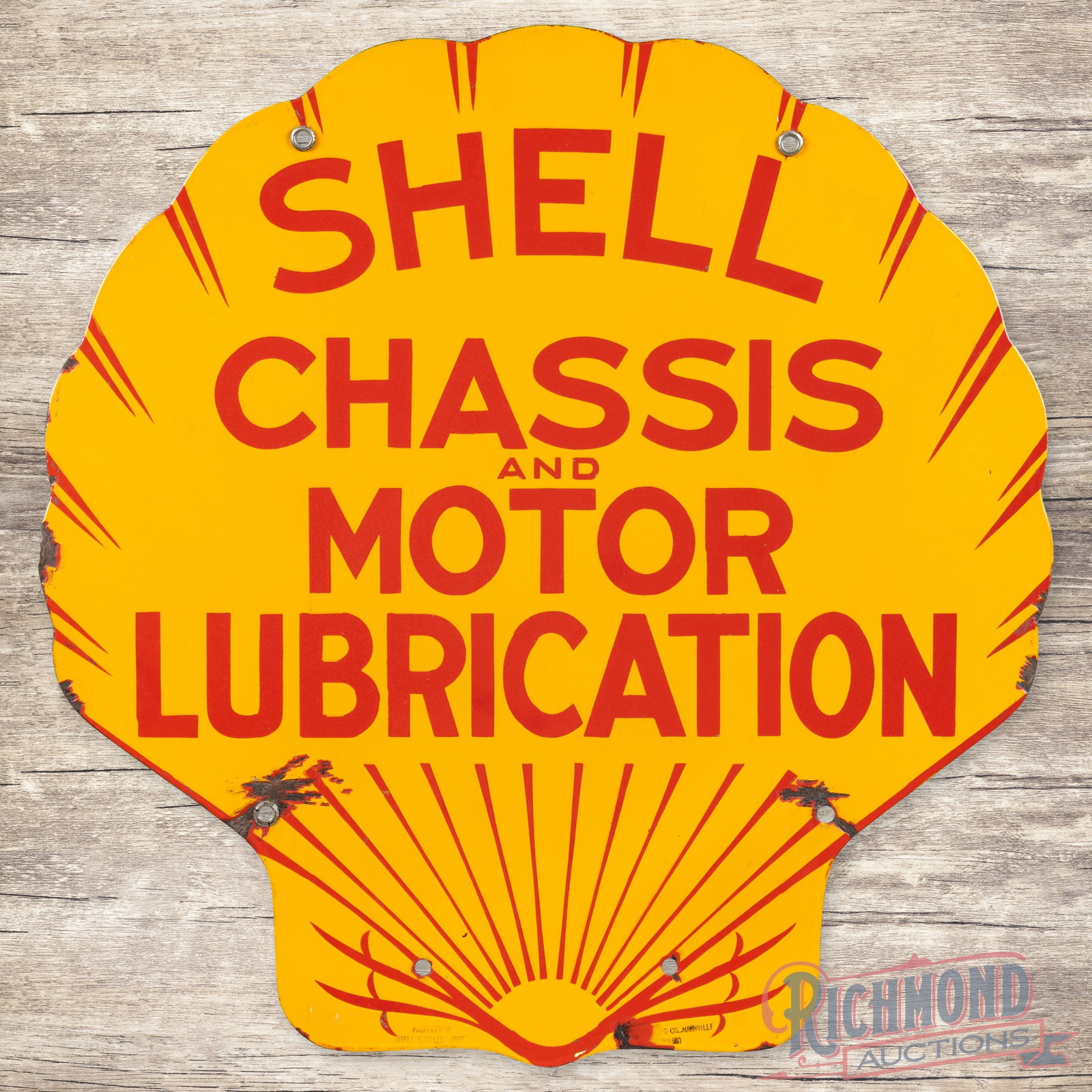 Shell Chassis and Motor Lubrication 24" Double Sided Porcelain Sign: DSP (double sided porcelain) die cut sign has excellent color and gloss. Side #1 has a clean field. The perimeter has chips at the mounting holes and edges. The reverse is in a similar condition to th