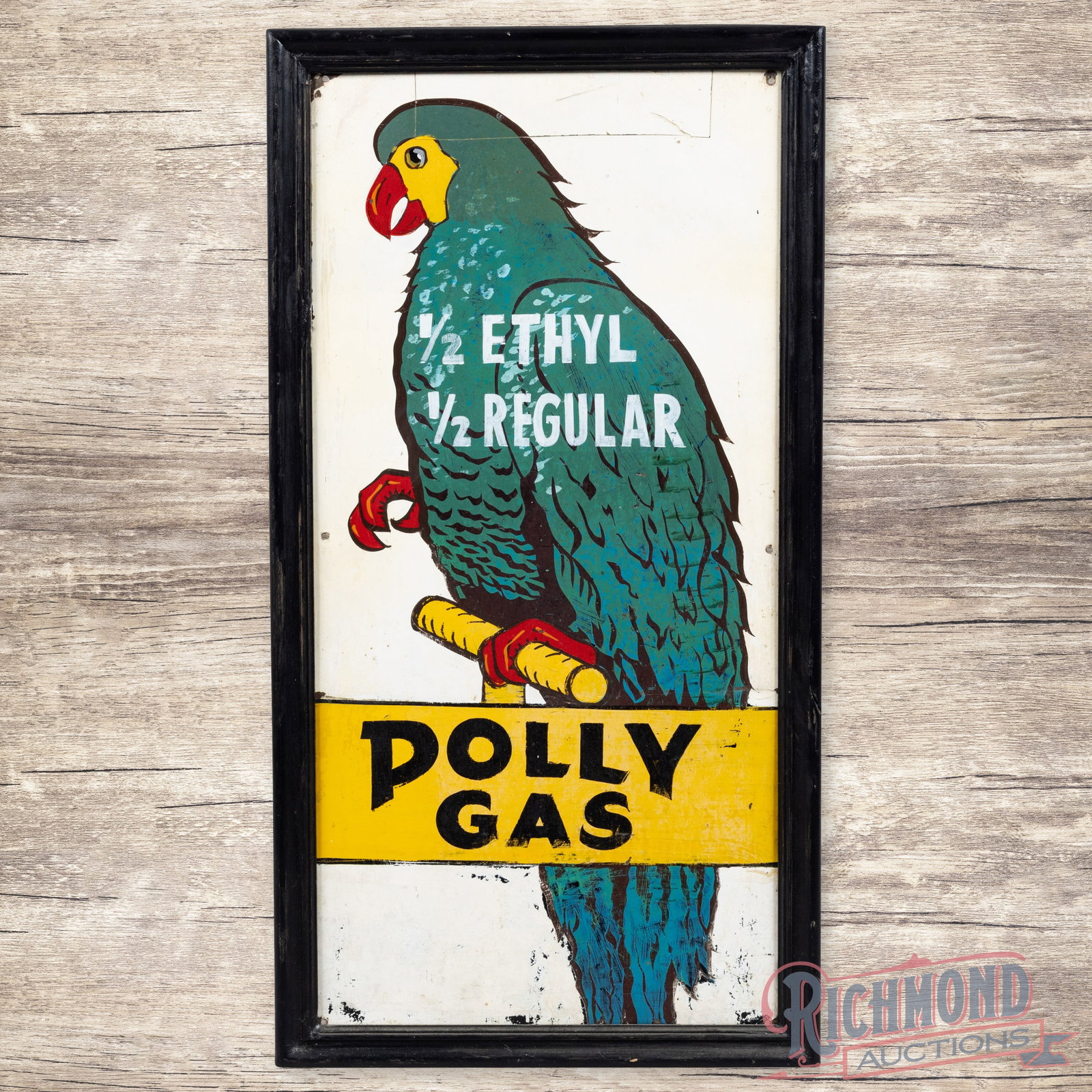 Polly Gas 1/2 Ethyl 1/2 Regular Gasoline 36" Single Sided Tin Pricer Sign w/ Parrot: SST (single sided tin) sign with an added wooden frame has good color and shine. The sign features a large parrot graphic with "Polly Gas" lettering in the lower field. The surface has older hand pain